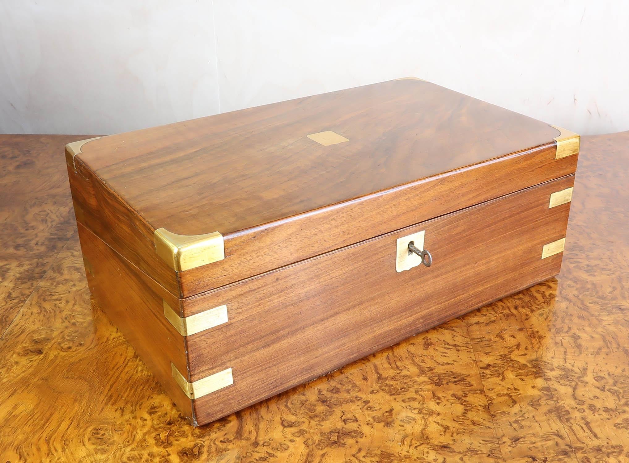 Wonderful figured walnut writing box or slope

Fabulous colour and figure in the wood particularly on the top

Working secret drawers*

Original brass topped ink bottle

Replaced leather

With Key

Free UK shipping

*the cover on the secret drawers