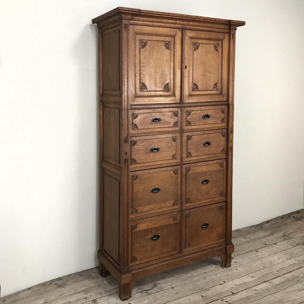 Antique file cabinet makes a great accent piece for the office, or as a toy organizer for a youngster's bedroom! Multiple compartments are accessed with drawers below and a cabinet above, which could even contain a small TV, perfect for the young at