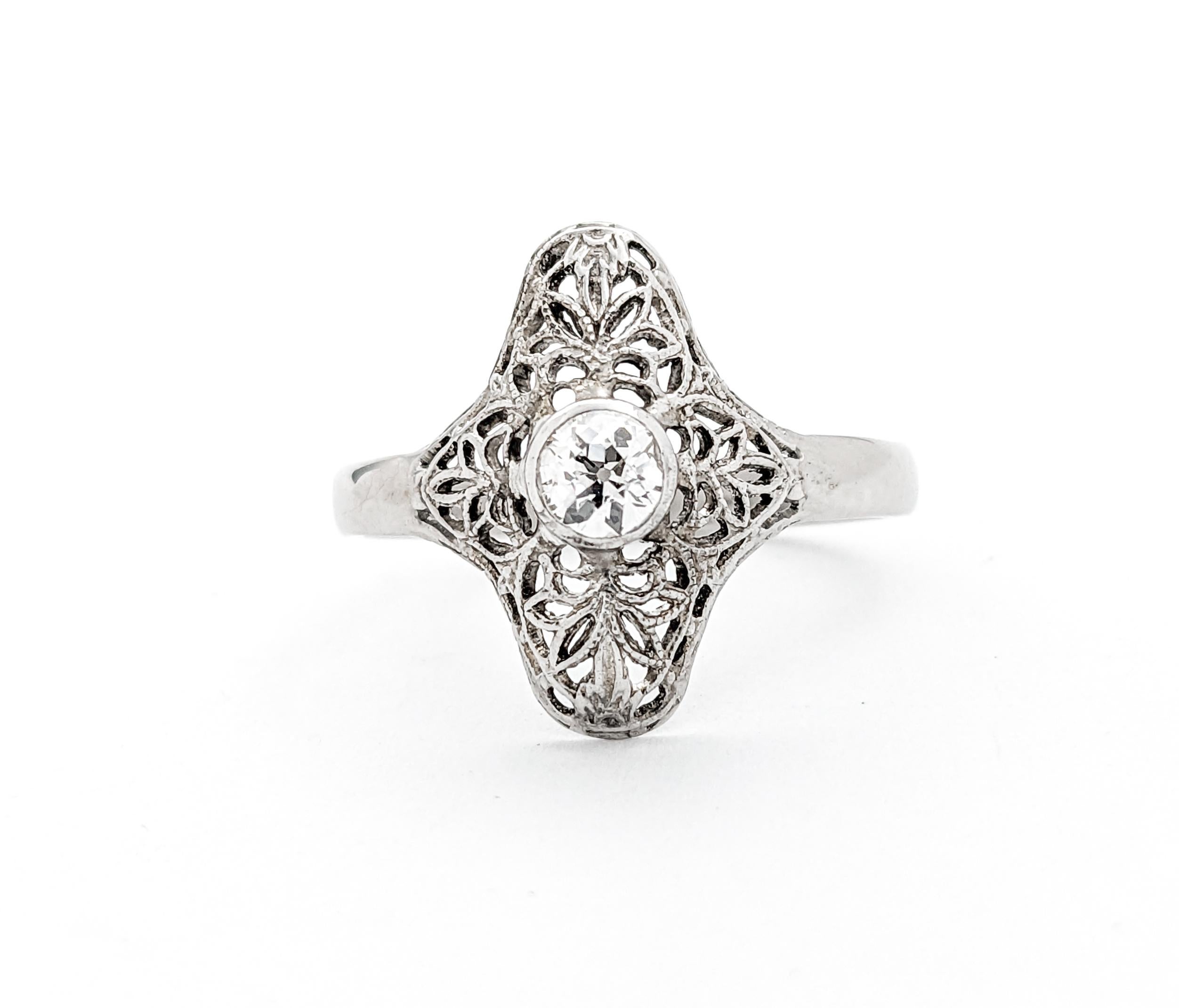 Antique Art Deco Style Filigree Ring In White Gold

This exquisite Antique Ring, crafted in the timeless Art Deco style, is a testament to the elegance and sophistication of the era. Meticulously fashioned in 14k White Gold, this piece features