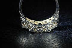 Antique Filigree ring set with a 1.53 Carat Diamond and 0.55 Carat Each Side