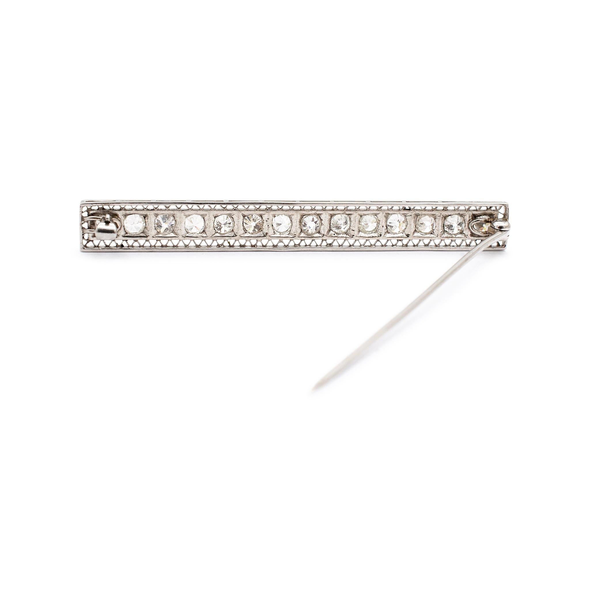 Gender: Unisex

Metal Type: Platinum & 14K White Gold

Length: 2.50 inches

Width: 7.50 mm

Weight: 8.50 grams

 Platinum and 14K white gold diamond antique brooch. The metals were tested and determined to be platinum and 14 Karat white gold. In