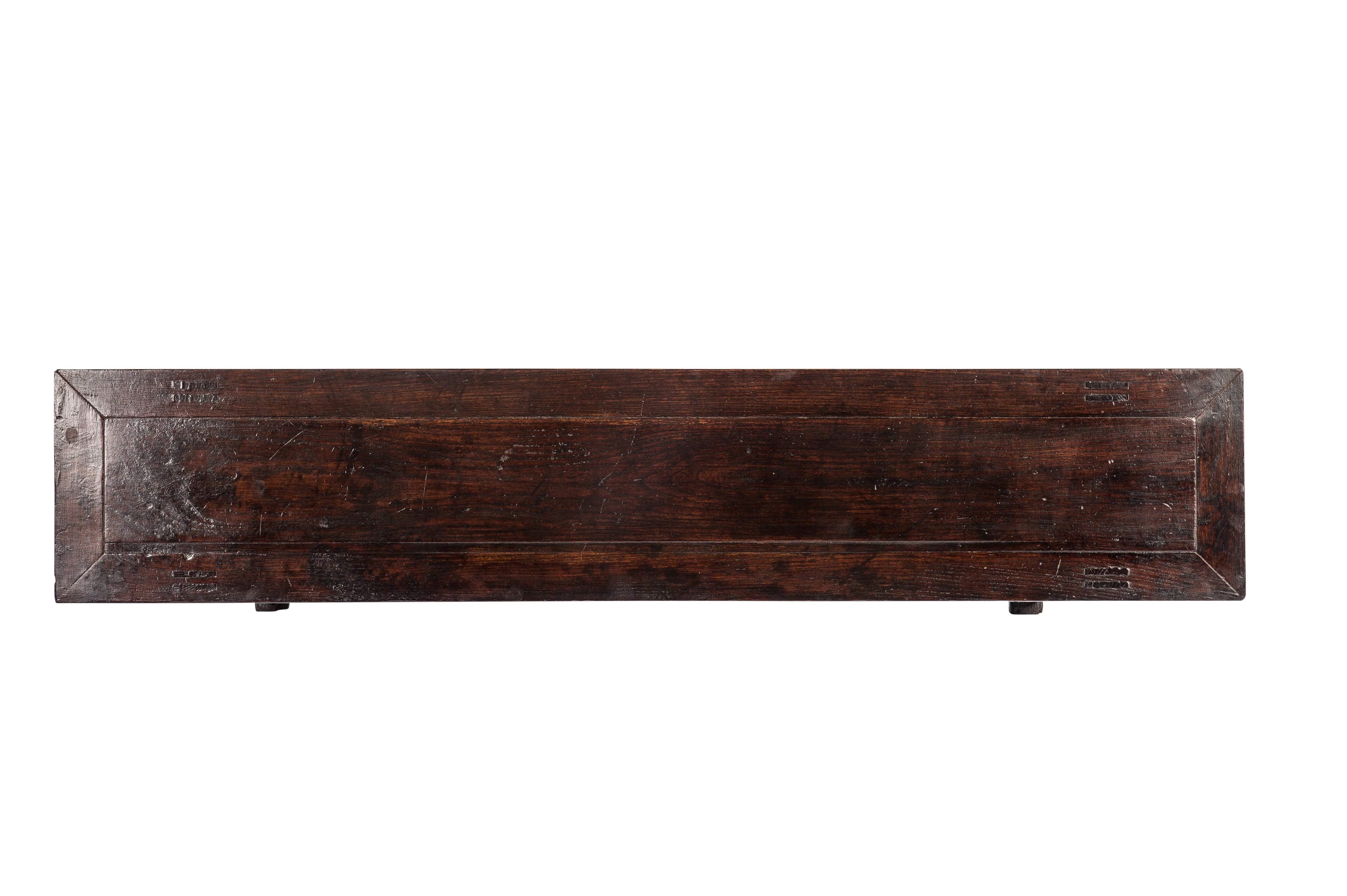 This elegant Altar table was made in the Chinese Shanxi period and dates approximately 1850. 
It is well constructed using mortise and tenon joinery techniques as was common on these tables. 
The altar table has a floating panel top with three
