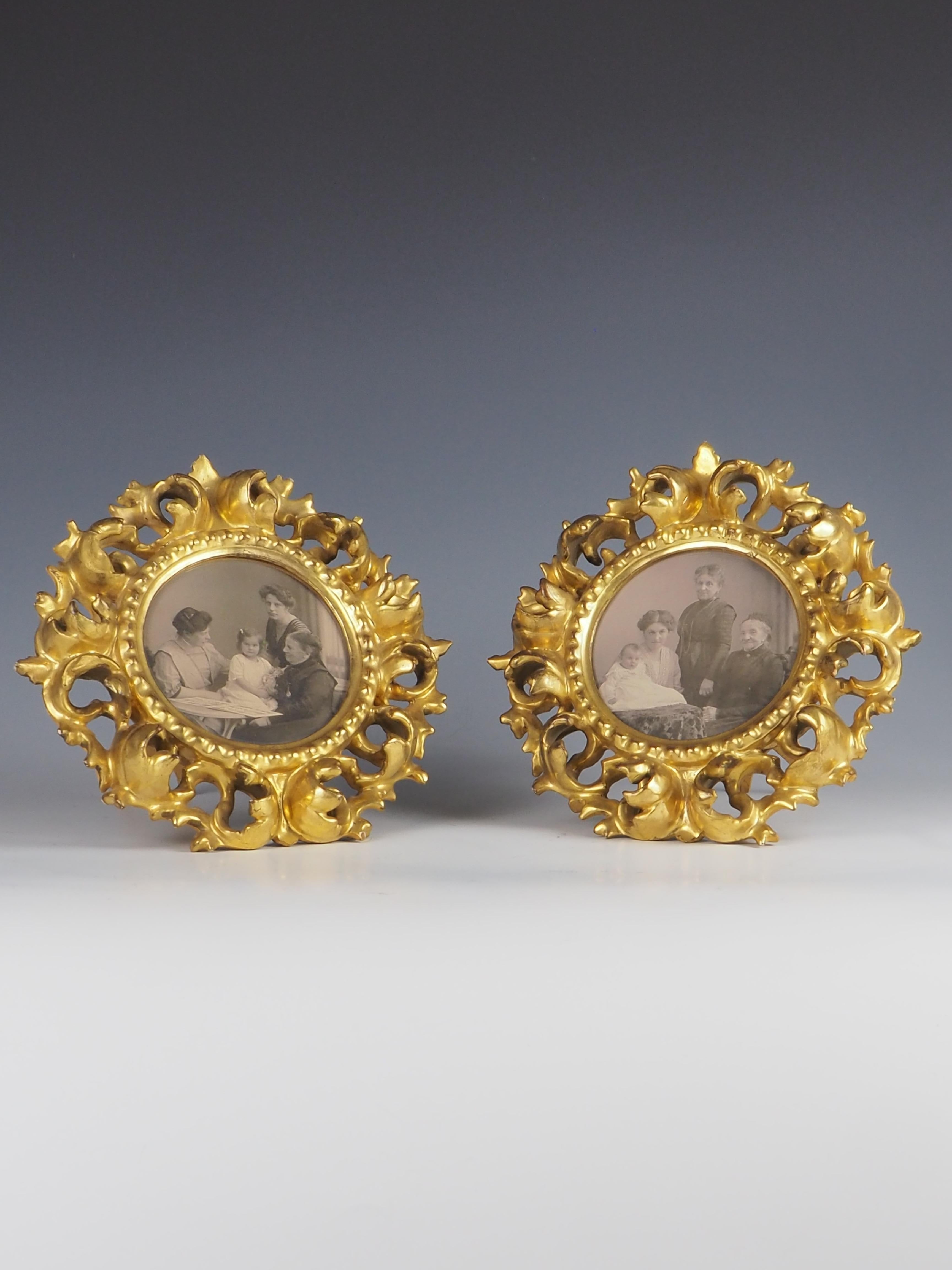 Exquisite pair of Antique Italian Giltwood Florentine Photo Frames showcases the timeless elegance and intricate craftsmanship characteristic of Florentine artistry.

Each frame is adorned with stunning gilt leaves that create a visually captivating