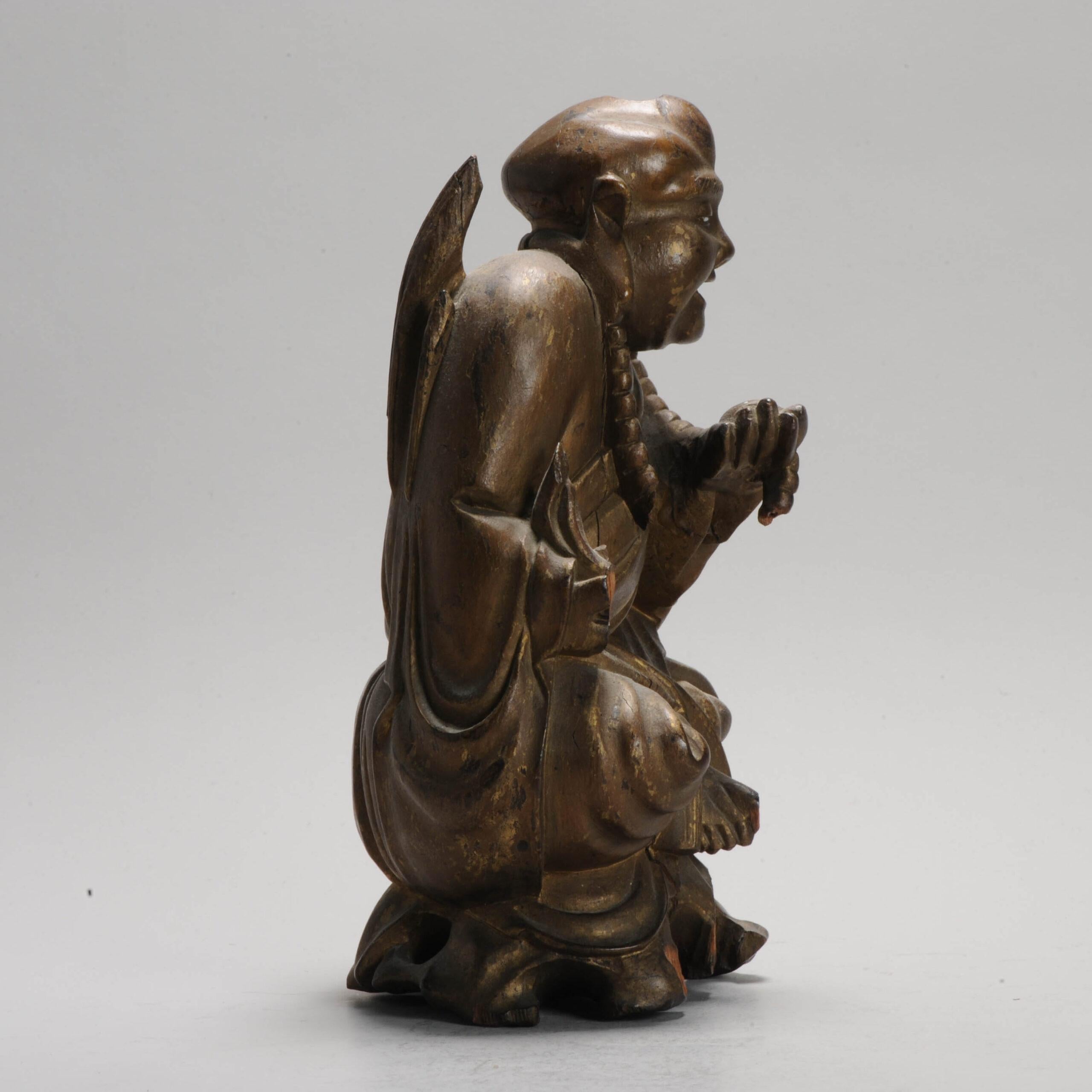 Ca 1900 Fine Chinese Carved Wood Statue of a Laughing Buddha CHinese Antique.

Additional information:
Material: Wood / Bamboo
Region of Origin: China
Period: 19th century
China Dynasty Period: Qing (1661 - 1912)
Condition: Good with some ware, and