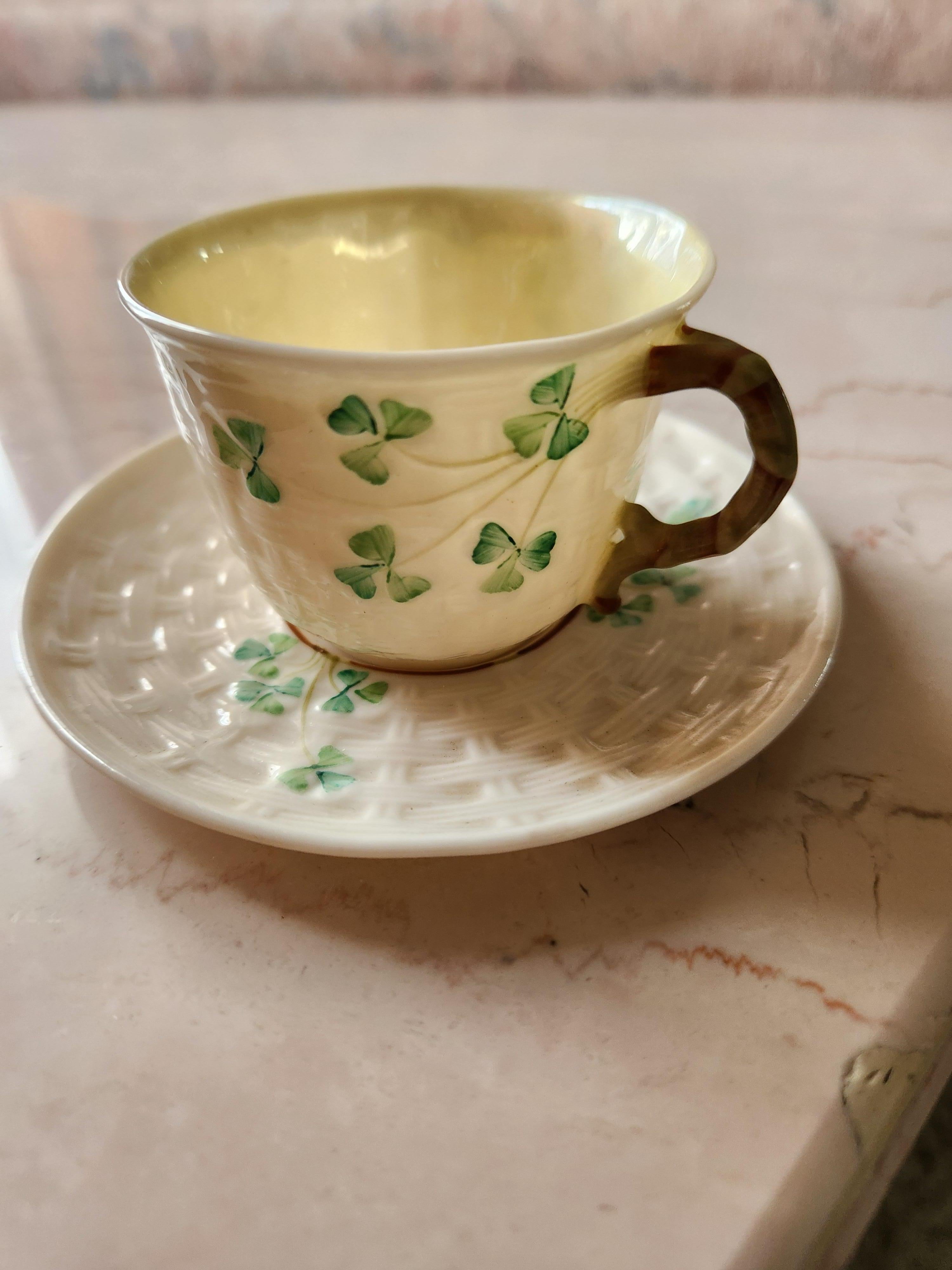 Fine Irish Belleek Demitasse Cup and Saucer
basketweave shamrock eggshell antique porcelain
Saucer 4.5 Cup 2.5 x 2h
maker stamp present
hand painted
original estate preowned vintage condition
refer to images provided please