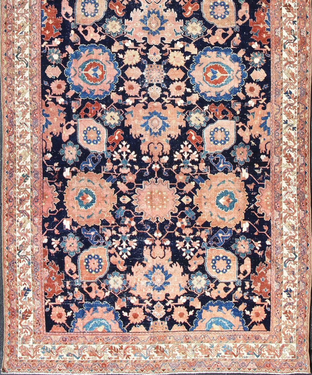 Persian Malayer with navy blue and peach with all-over design. Rug/R20-107
This antique Persian Malayer rugs traditional pattern with proportions, colors and motifs uniquely suited to Western tastes and interiors. This Persian rug displays a navy