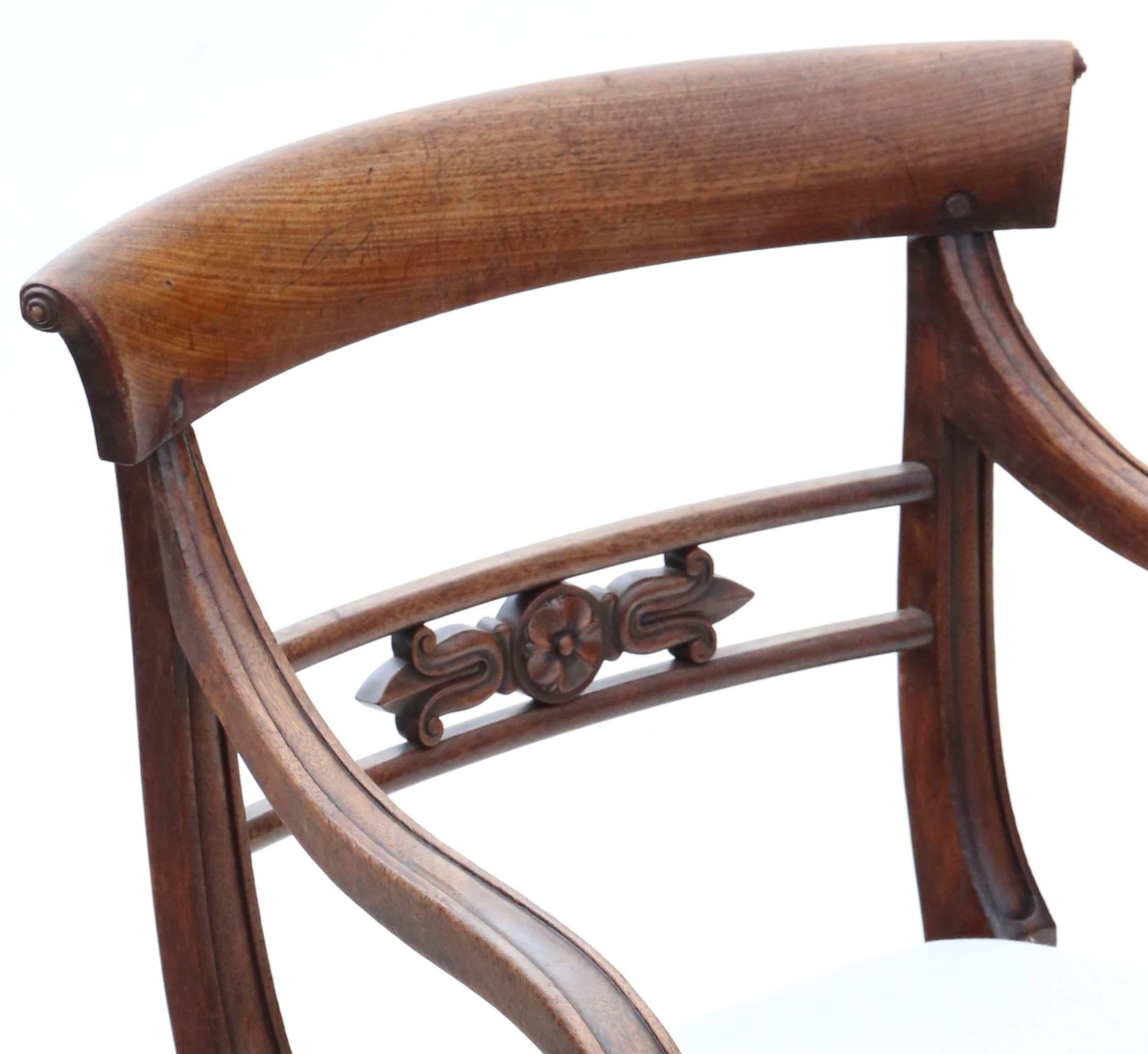 Antique fine quality 19th century mahogany elbow, carver or desk chair. Very rare, with an elegant design.

No loose joints.

Professional new upholstery

Overall maximum dimensions: 61cmW x 58cmD x 85cmH (48cm high seat when sat on, 68cm high