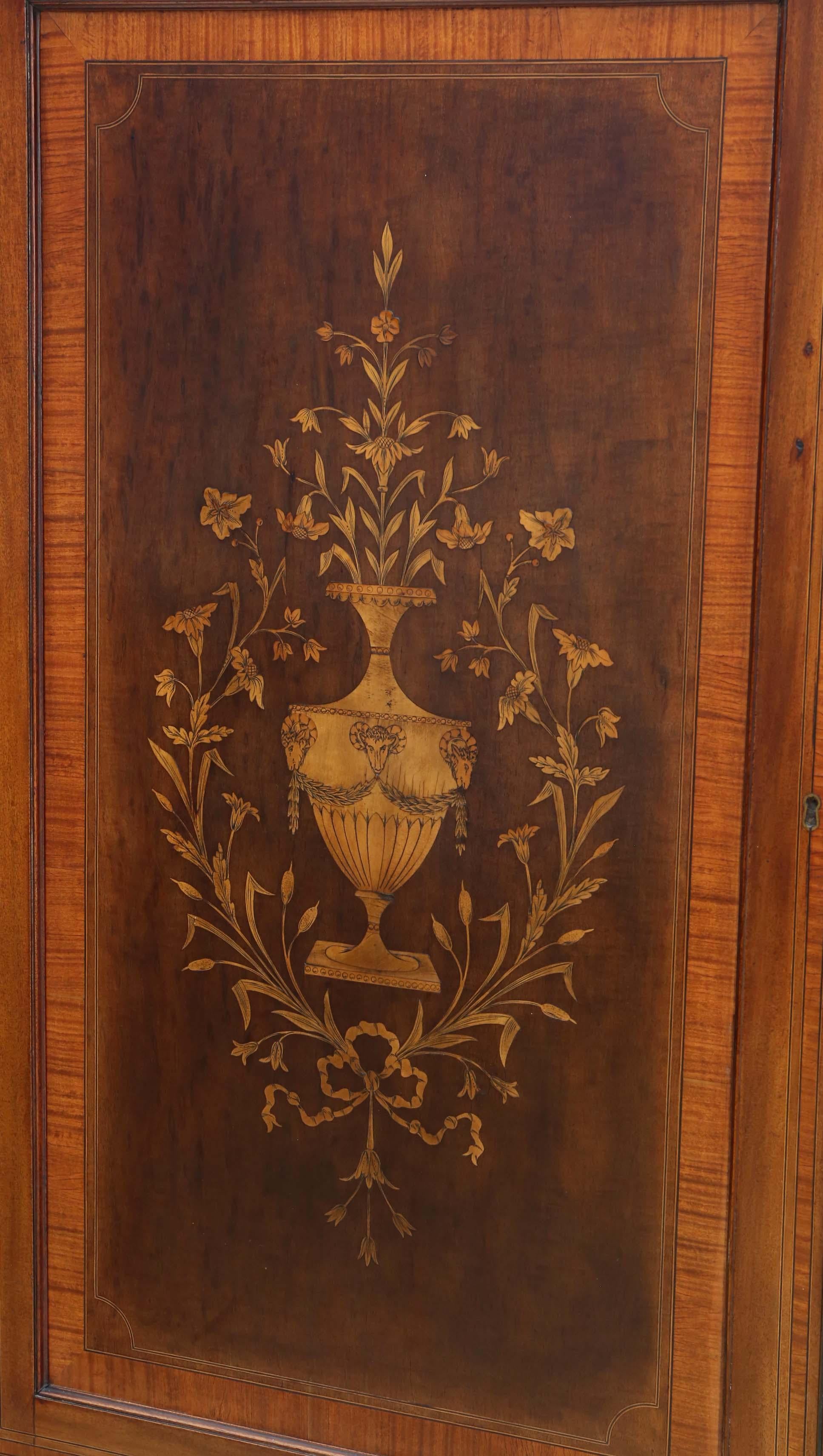 Antique fine quality mid-19th century marquetry mahogany linen press wardrobe buy arguably one of the best London makers 'Edwards and Roberts'.

Solid and strong, with no loose joints. Full of age, character and charm. Magnificent marquetry to the