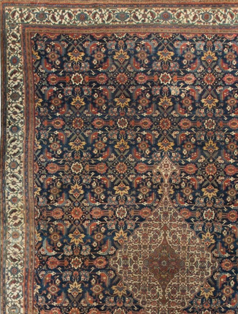 From the village of Bibikabad in the Hamadan region of Persia comes this beautiful piece. The clever design with the soft central medallion almost floating on top of the deep blue field. The contrasting light border sets the rug off to perfection.