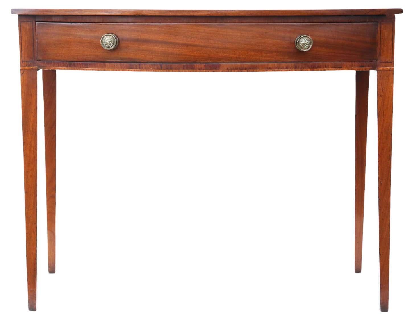 Antique Fine Quality Georgian Mahogany Bow Front Writing Dressing Table, 19th Century – also ideal as a desk or side table.

This exceptional piece features solid construction with tight joints, exuding character and charm as a rare and desirable