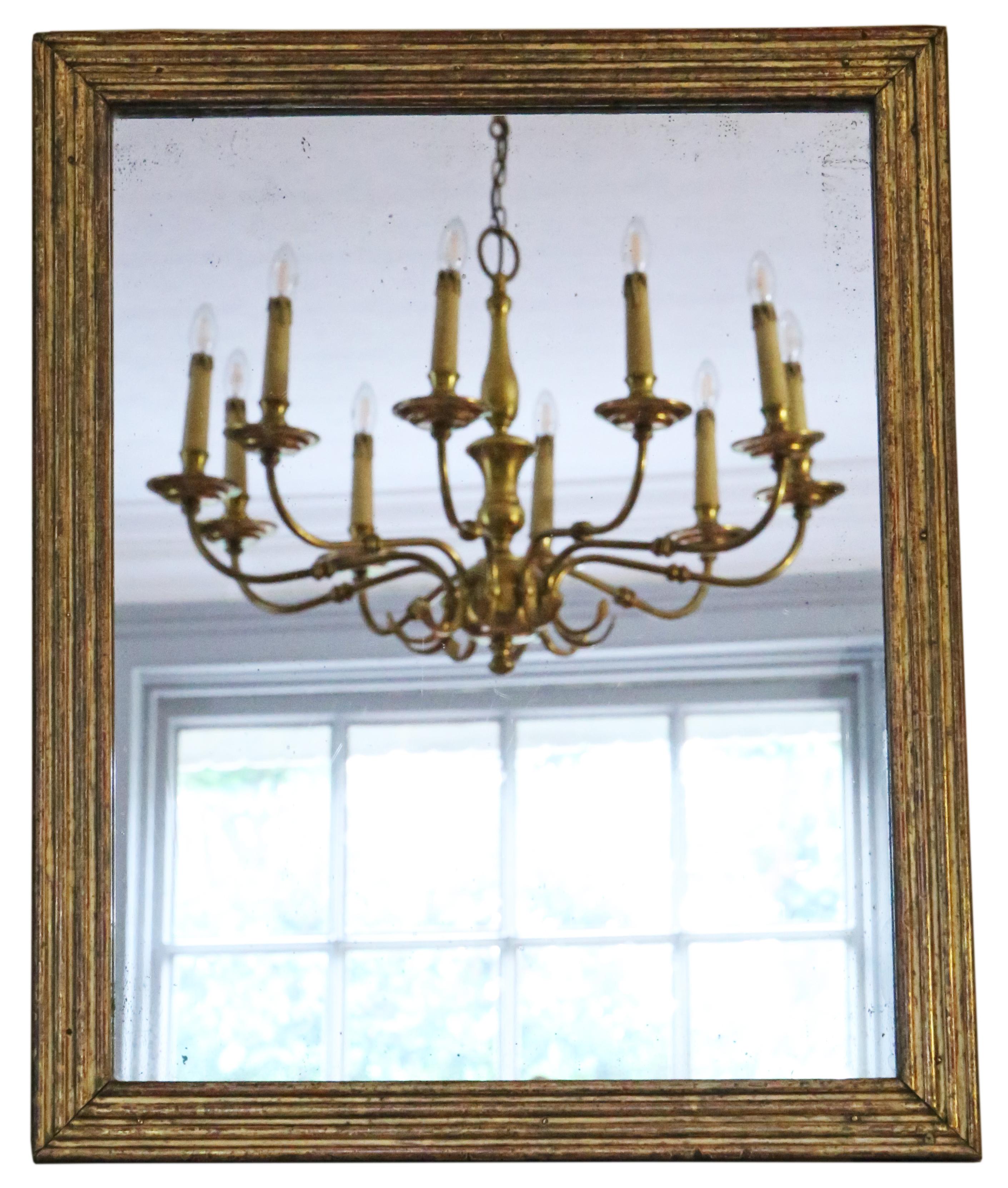 Antique fine quality gilt wall or overmantle mirror, 19th Century.

An impressive rare find, that would look amazing in the right location. No loose joints.

The original mirrored glass has light oxidation and age related imperfections. Original