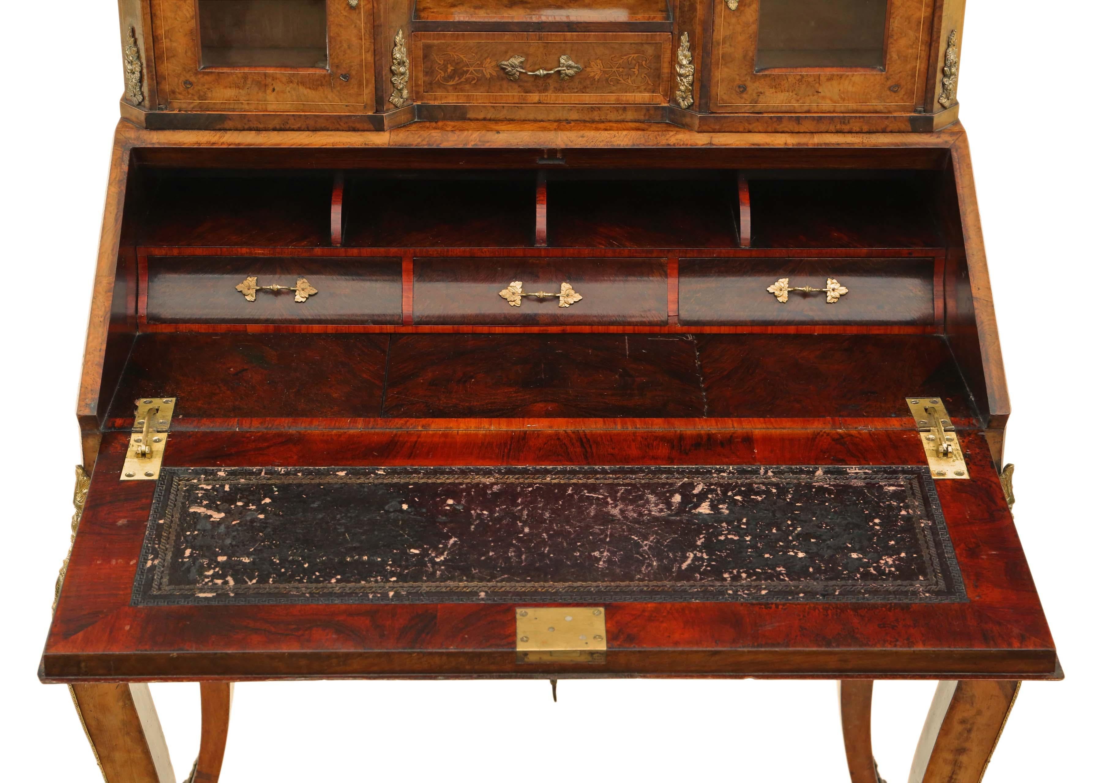 Antique fine quality inlaid burr walnut Bonheur de Jour bureau desk writing table 19th Century. Veneer on mahogany construction, very heavy and strong.

Drop well bureau compartment with patinated tooled leather writing surface. The mirrored glass
