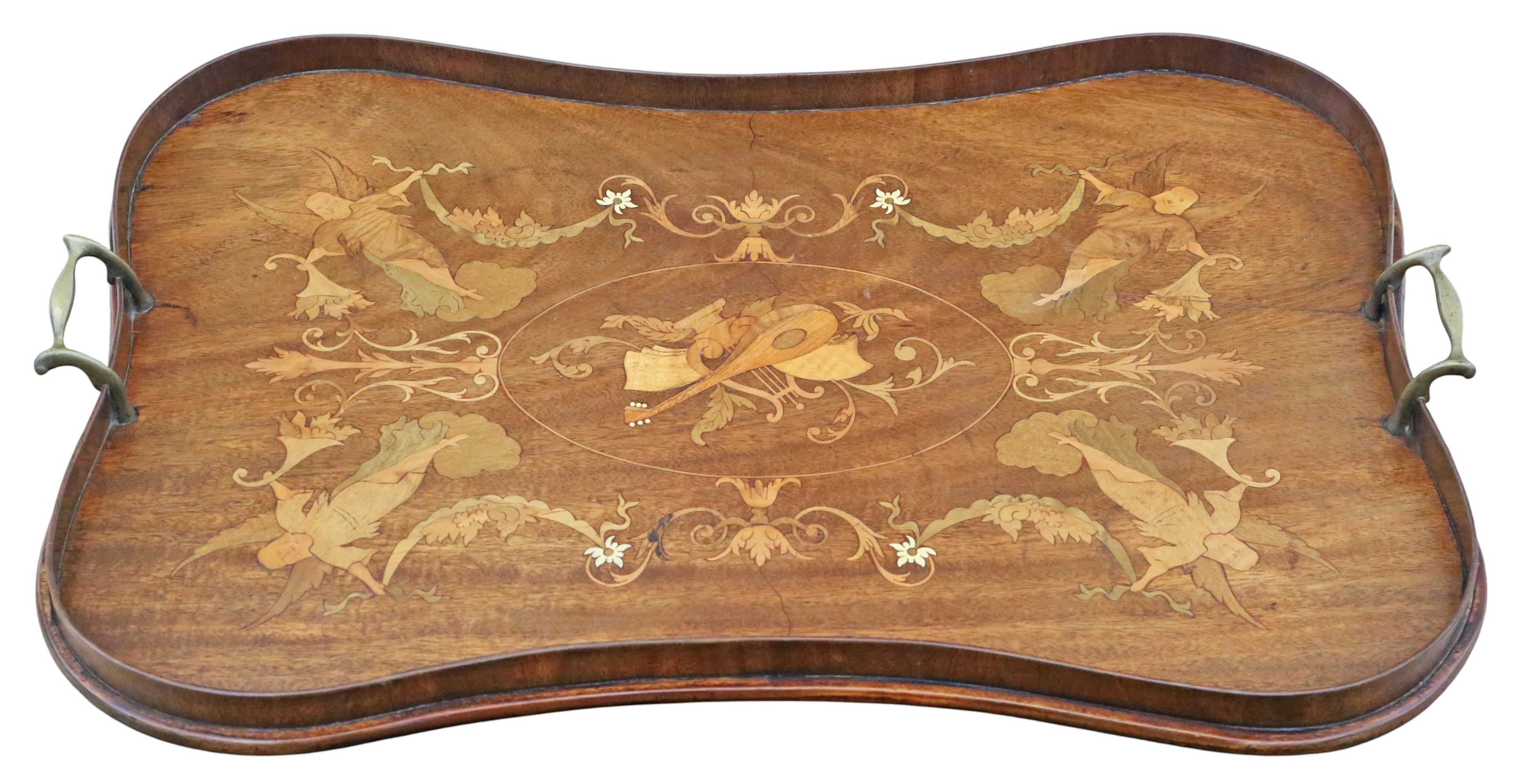 Antique Fine Quality Inlaid Mahogany Serving Tray – c.1900

Full of authentic charm and character, this rare decorative find would make a wonderful statement piece in the right setting. Beautifully crafted with detailed marquetry inlays and elegant