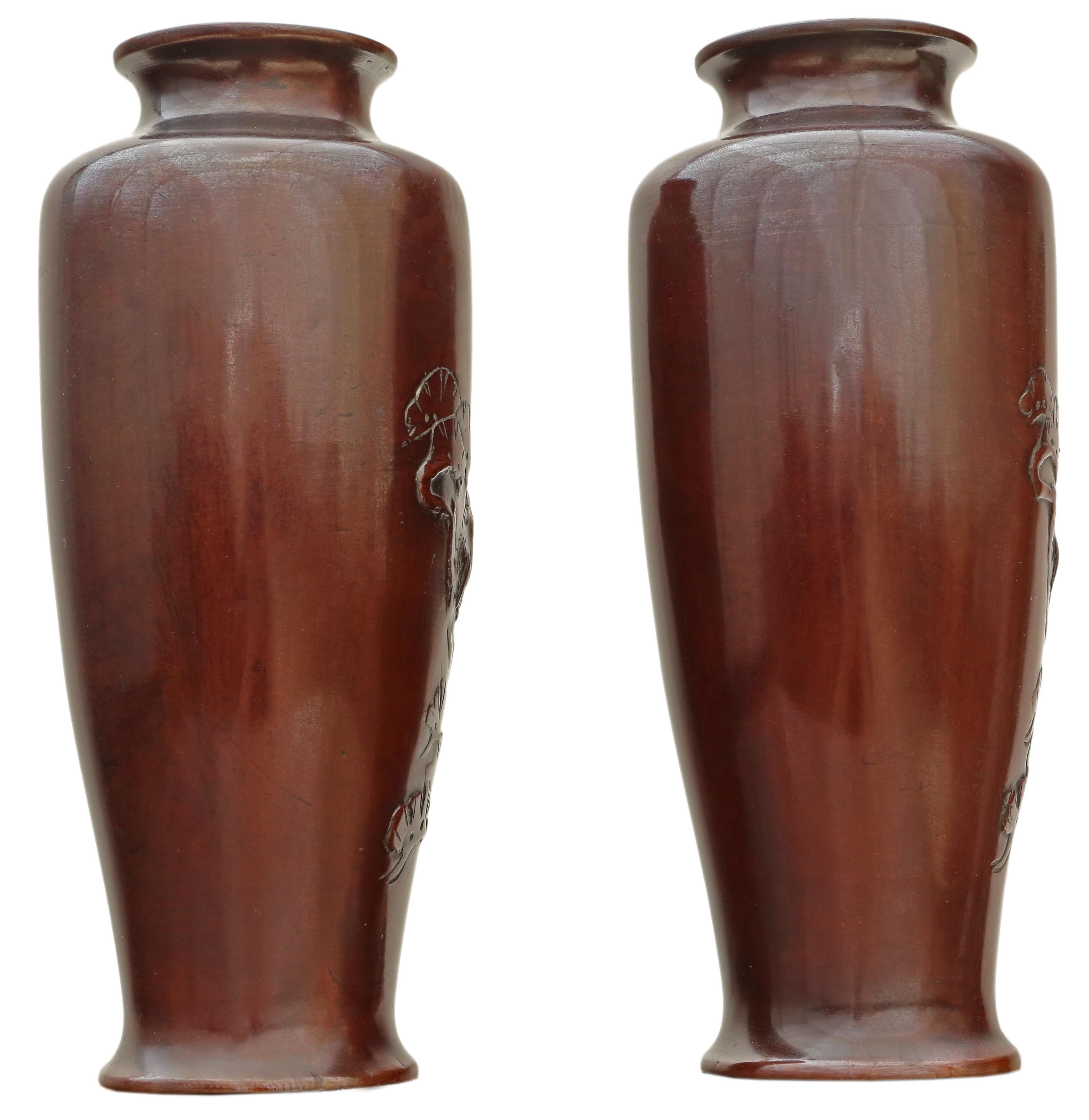 Antique fine quality Japanese Meiji period pair of bronze vases circa 1910. Depicts Cranes.

Would look amazing in the right location. The very best colour and patina. Exudes quality and have a fantastic shape.

Overall maximum dimensions: