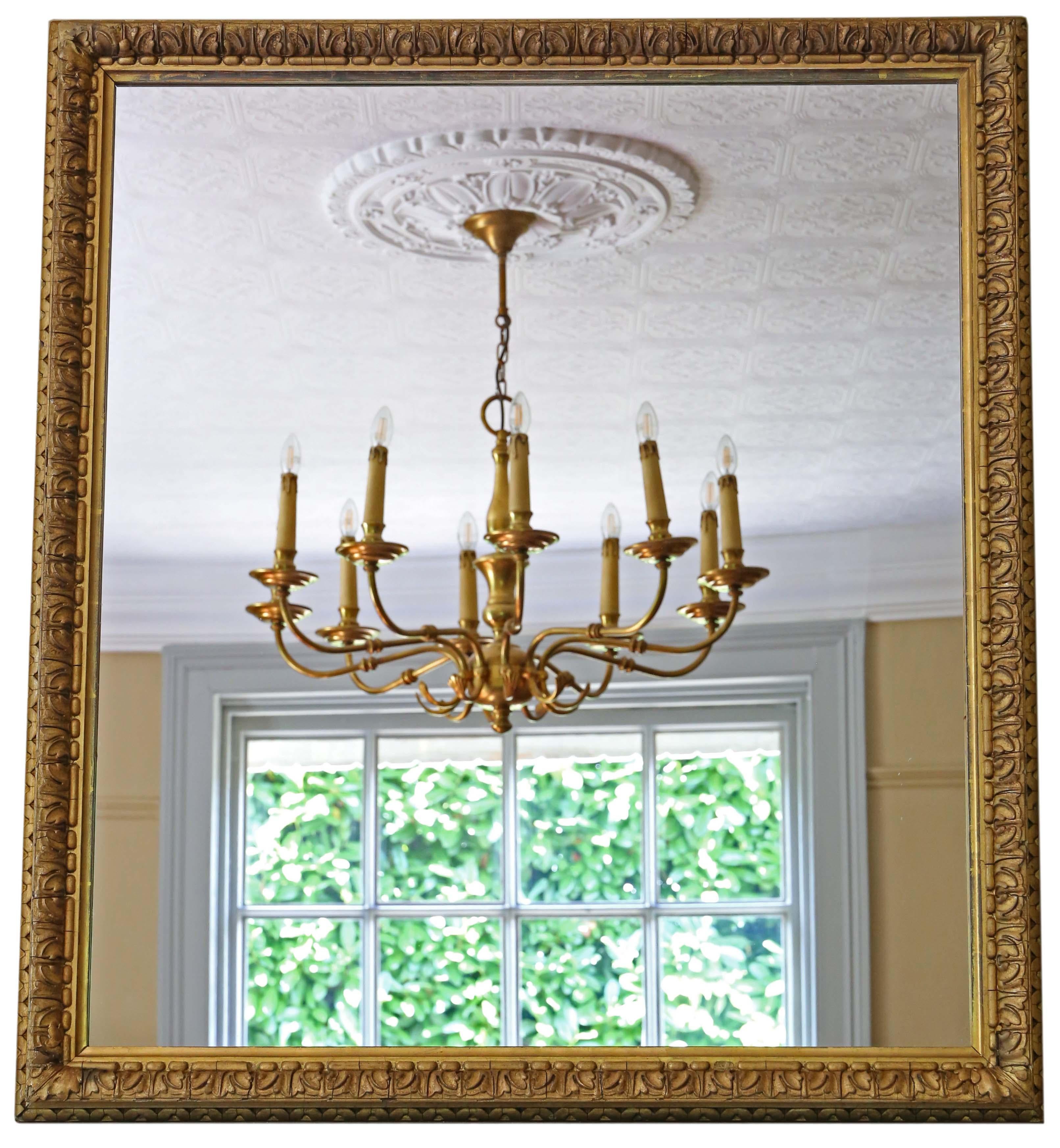 Antique fine quality large gilt 19th Century overmantle or wall mirror with a lovely charm and elegance.

This is a lovely, rare mirror and a great decorative find.

An impressive and rare find, that would look amazing in the right location. No