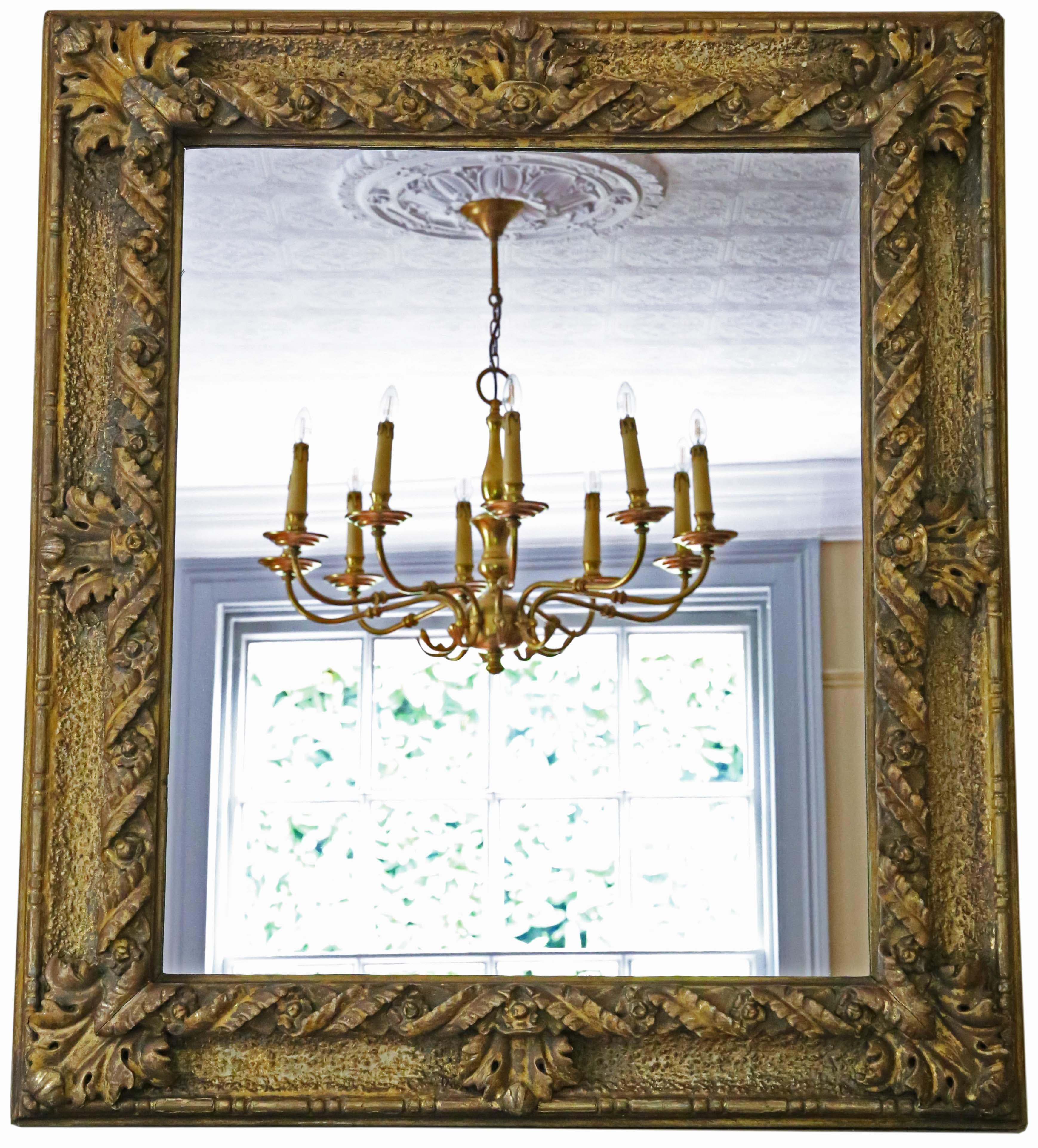 Antique fine quality large giltwood 19th Century overmantle or wall mirror with a lovely charm and elegance.

This is a lovely, rare mirror and a great decorative find.

An impressive and rare find, that would look amazing in the right location. No