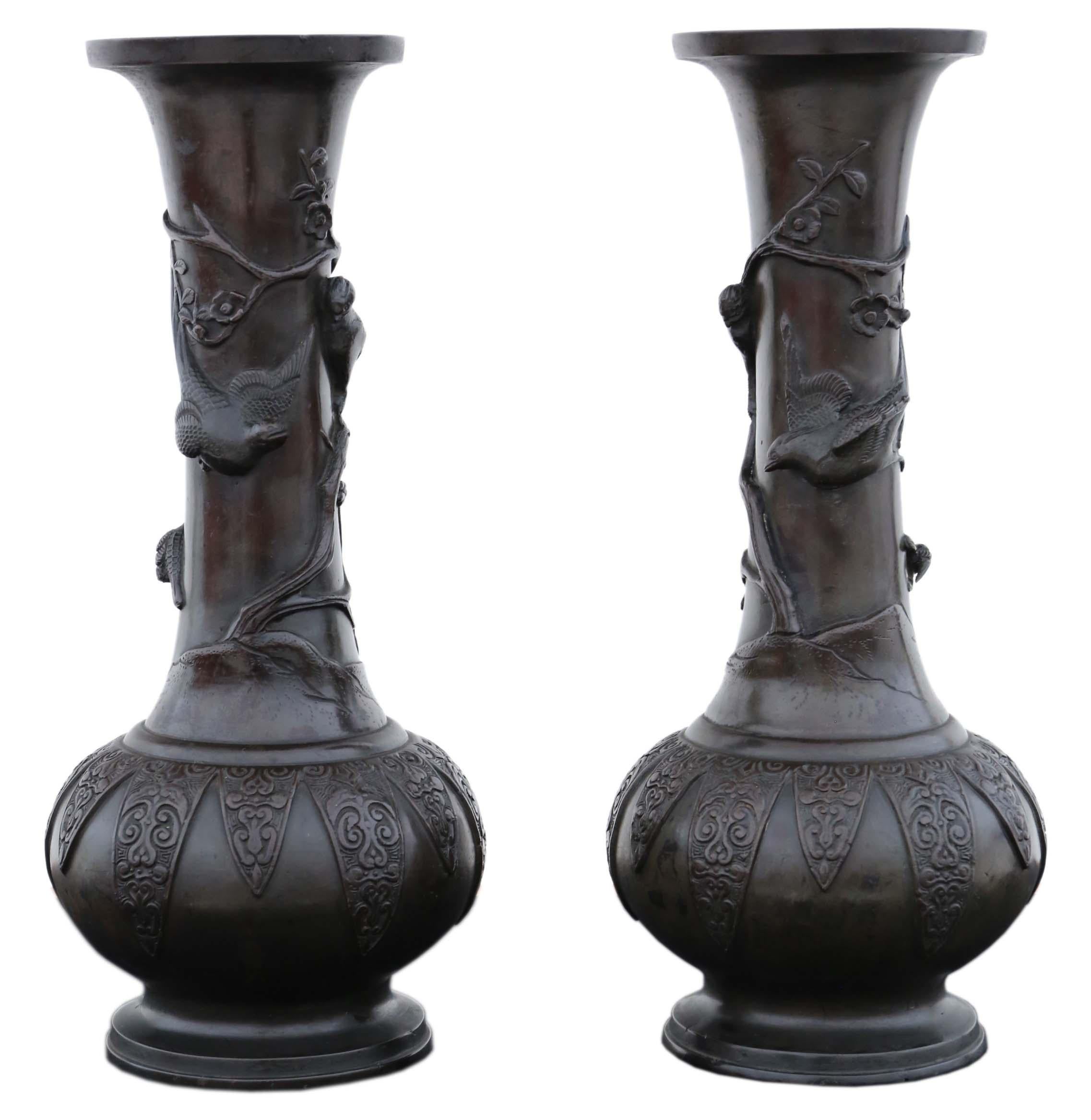 Antique very large pair of fine quality Japanese bronze vases 19th Century Meiji Period. Artist pieces with signature on the bases. 

Would look amazing in the right location. Rare large size and design.

Overall maximum dimensions: 41cmH x 19cm