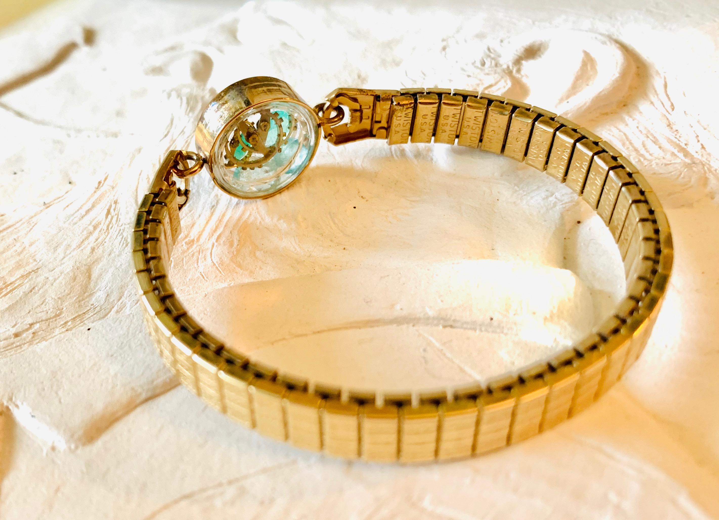 Art Deco Antique Fine Watch Talisman Bracelet Filled with Vintage Emeralds and Opals  For Sale