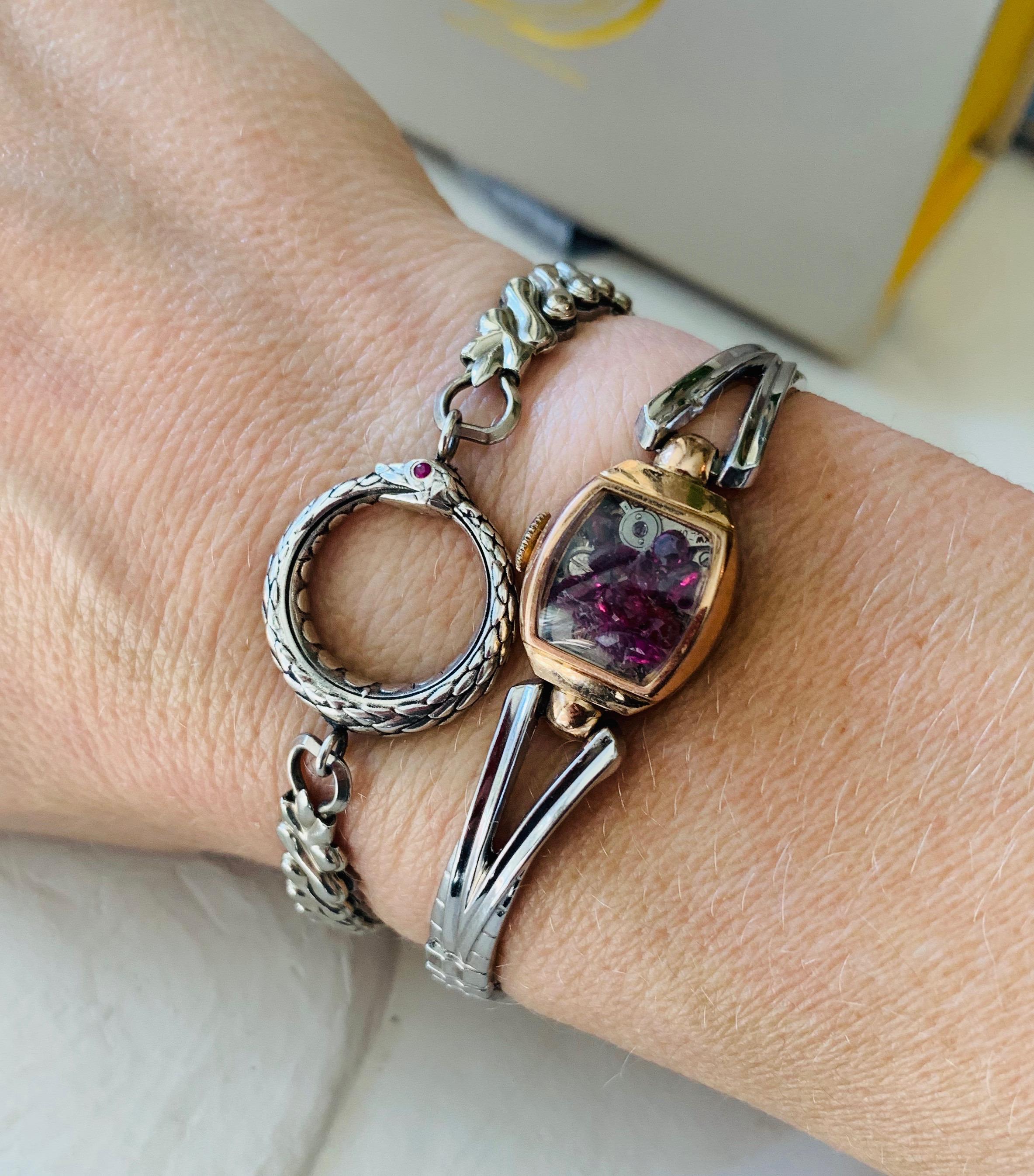 The Fairydust band is a non-functioning antique watch  a symbol, a talisman,
to hold the intention of staying present, neither dwelling in
the past nor looking toward the future. The fairydust inside this particular band is 2 carats of Vintage