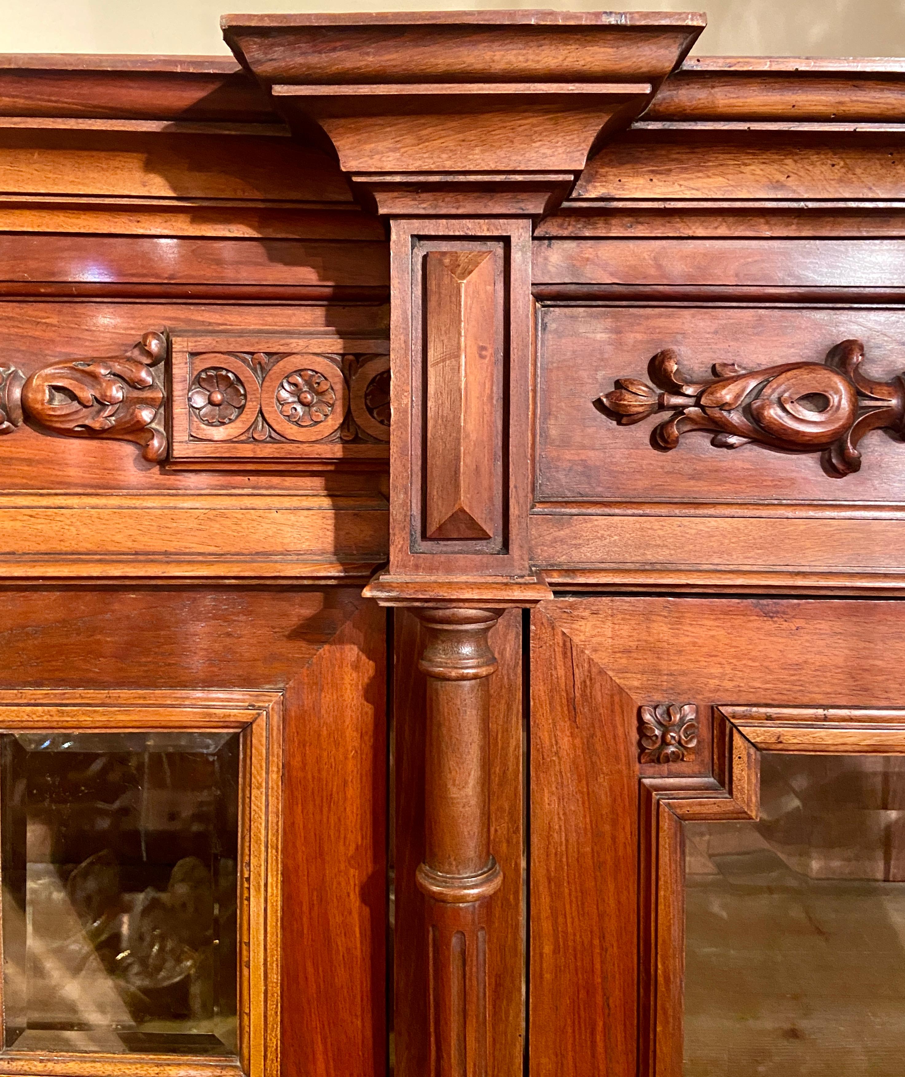 French Antique Finely Carved Walnut Bookcase with Beveled Glass Front For Sale