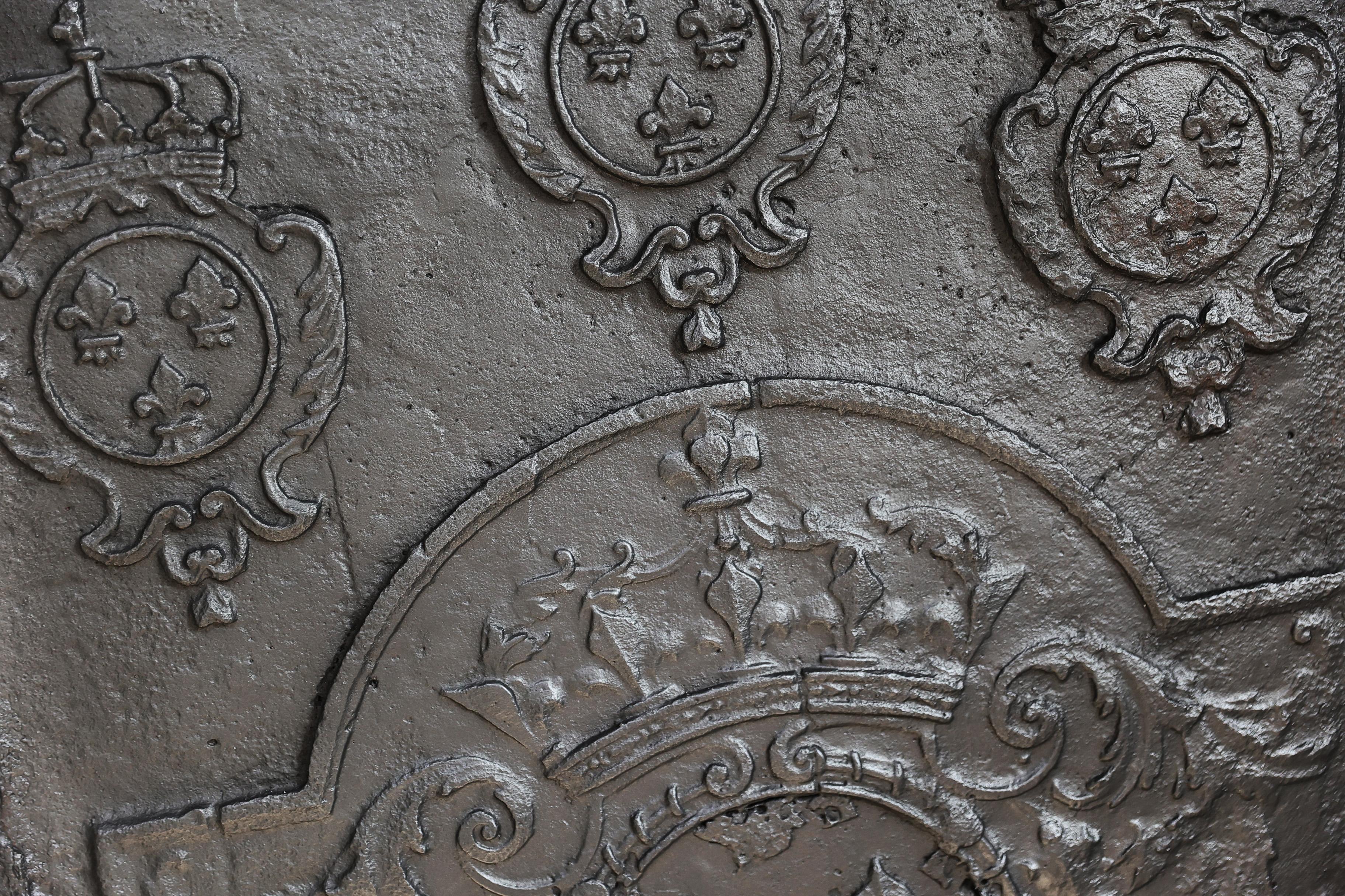 Iron Antique fireback from cast iron from the 18th century For Sale