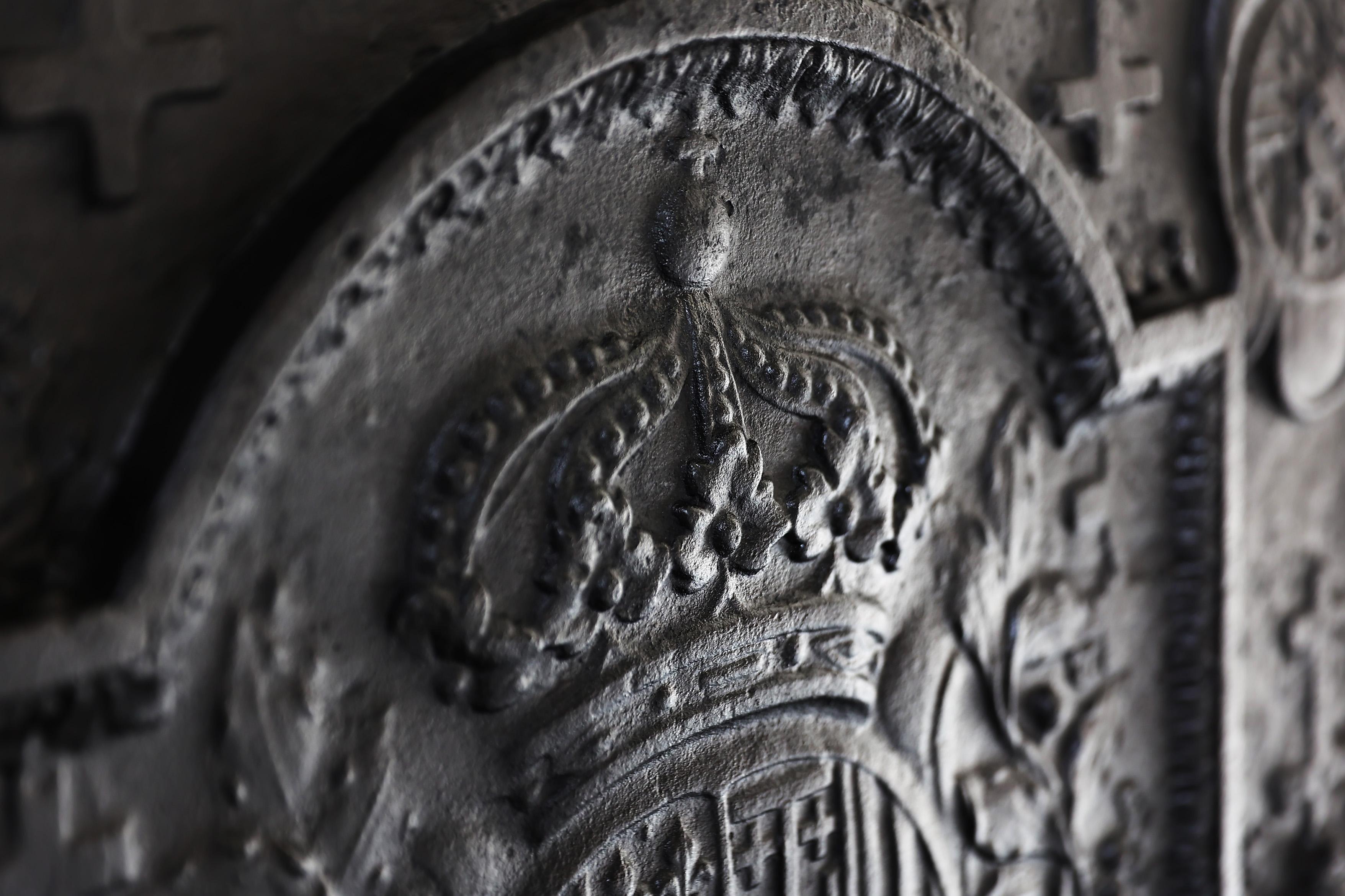Iron Antique fireback from cast iron from the early 18th century For Sale