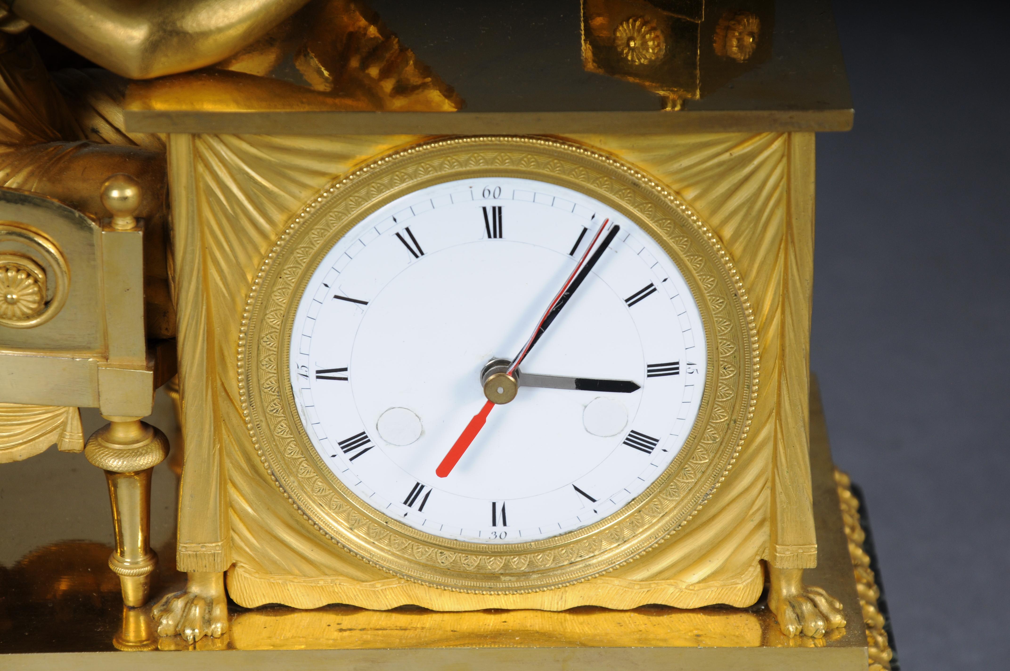 Gilt Antique fire-gilt Empire mantel clock, circa 1805, Paris. Masterpiece For Sale