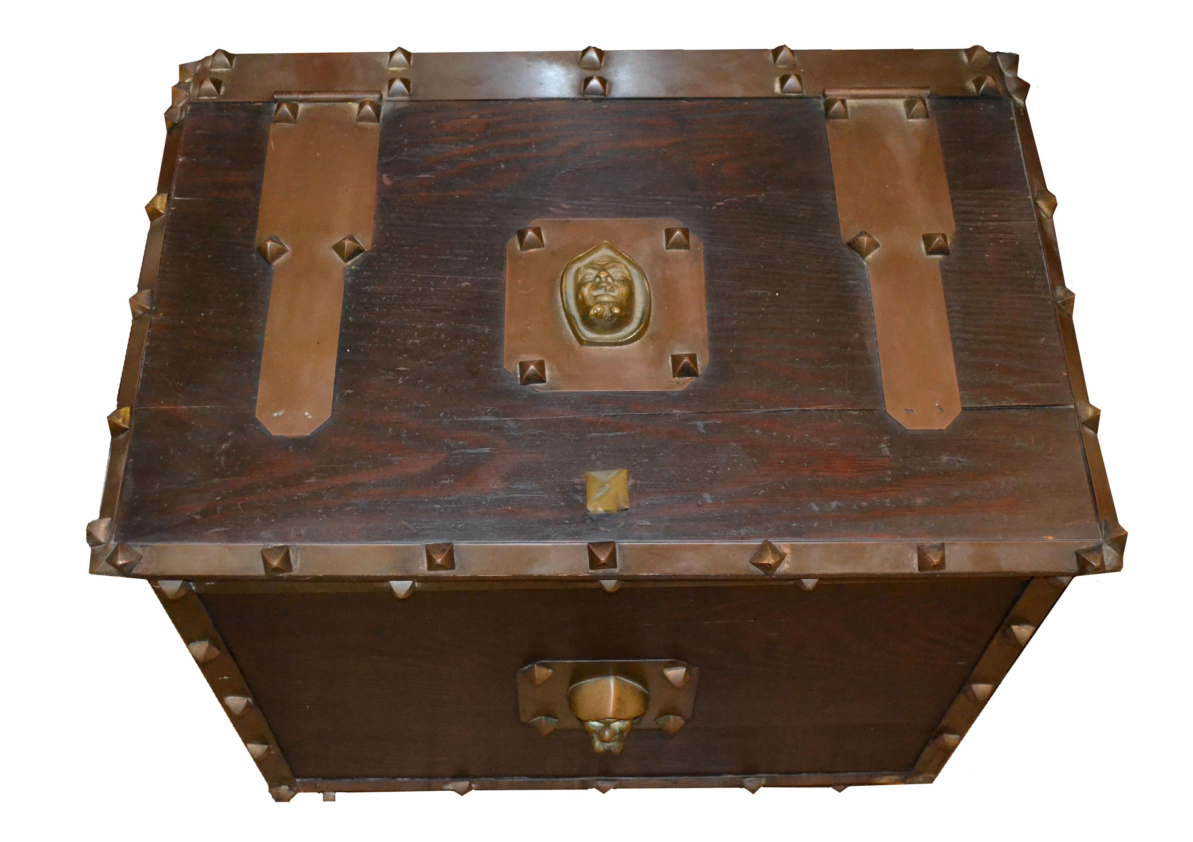 Antique pine and brass coal/tinder box with unique jesting friar bronze sculptures/handles, circa 1900. Dimensions: 21.5