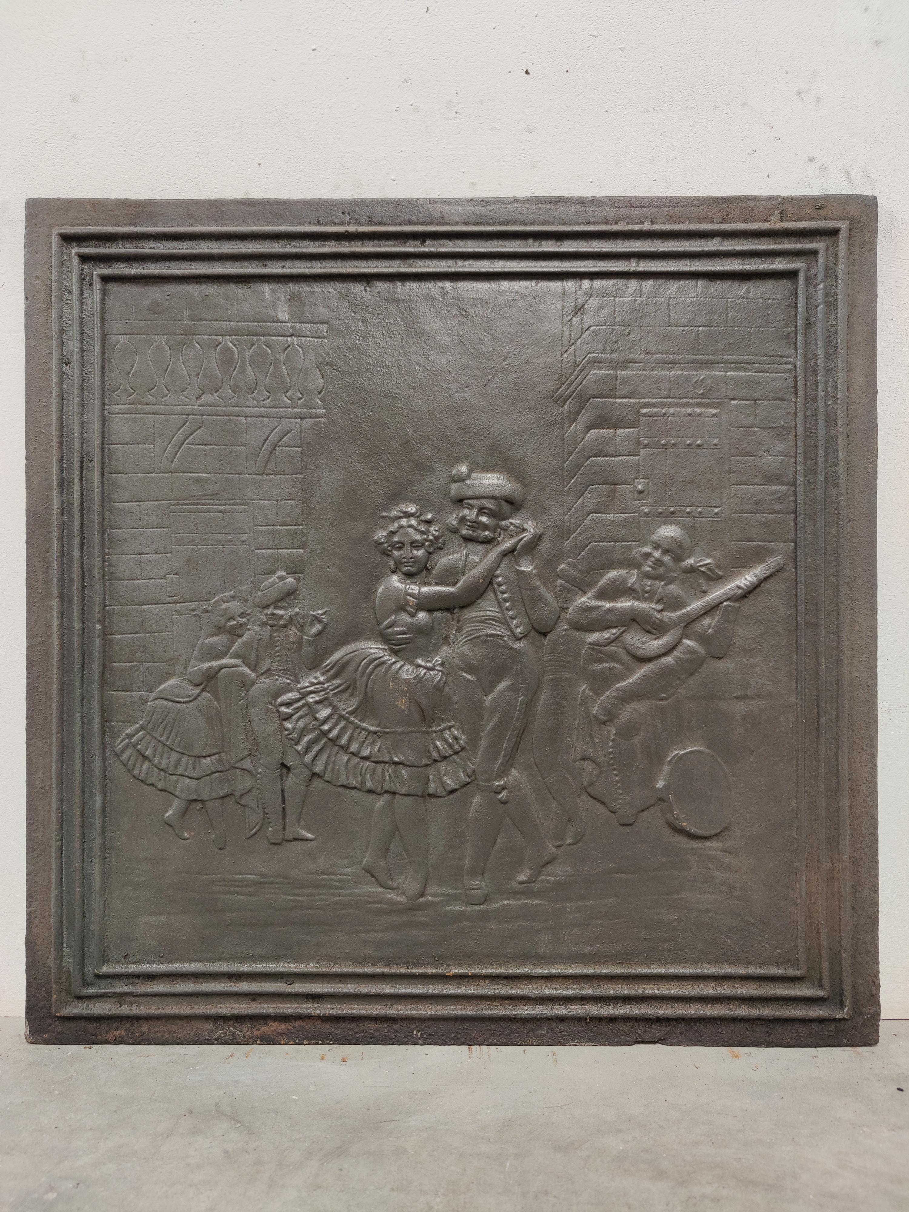 Antique fireback / backsplash, a couple dancing.

Nice square cast iron antique fireback displaying a French couple enjoying a nice dancing.
Great condition, can be used in a real gas or log fire.
Very decorative piece.
78 lbs / 35 kg.


  