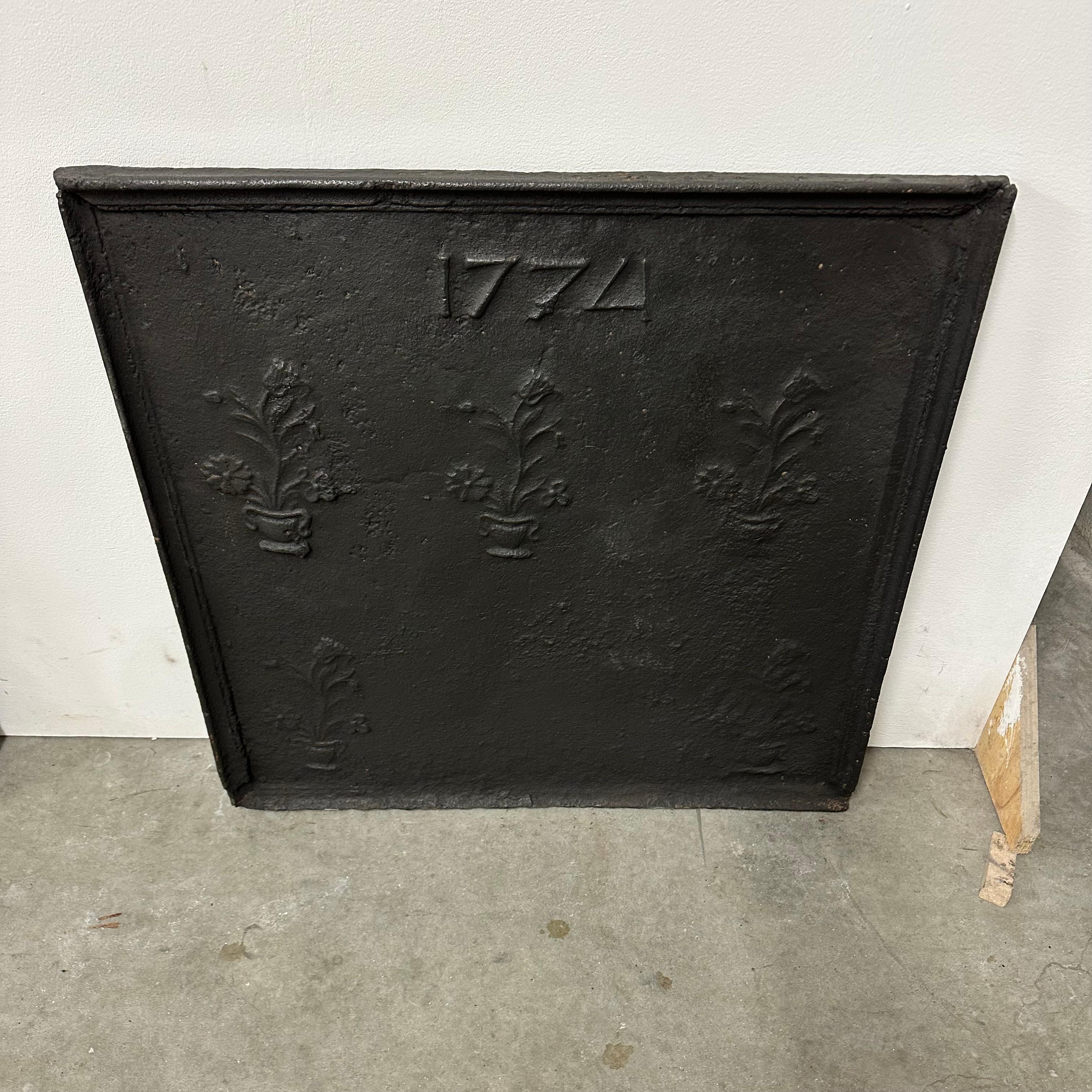 Iron Antique Fireback / Backsplash  Dated 1774 with Plants For Sale