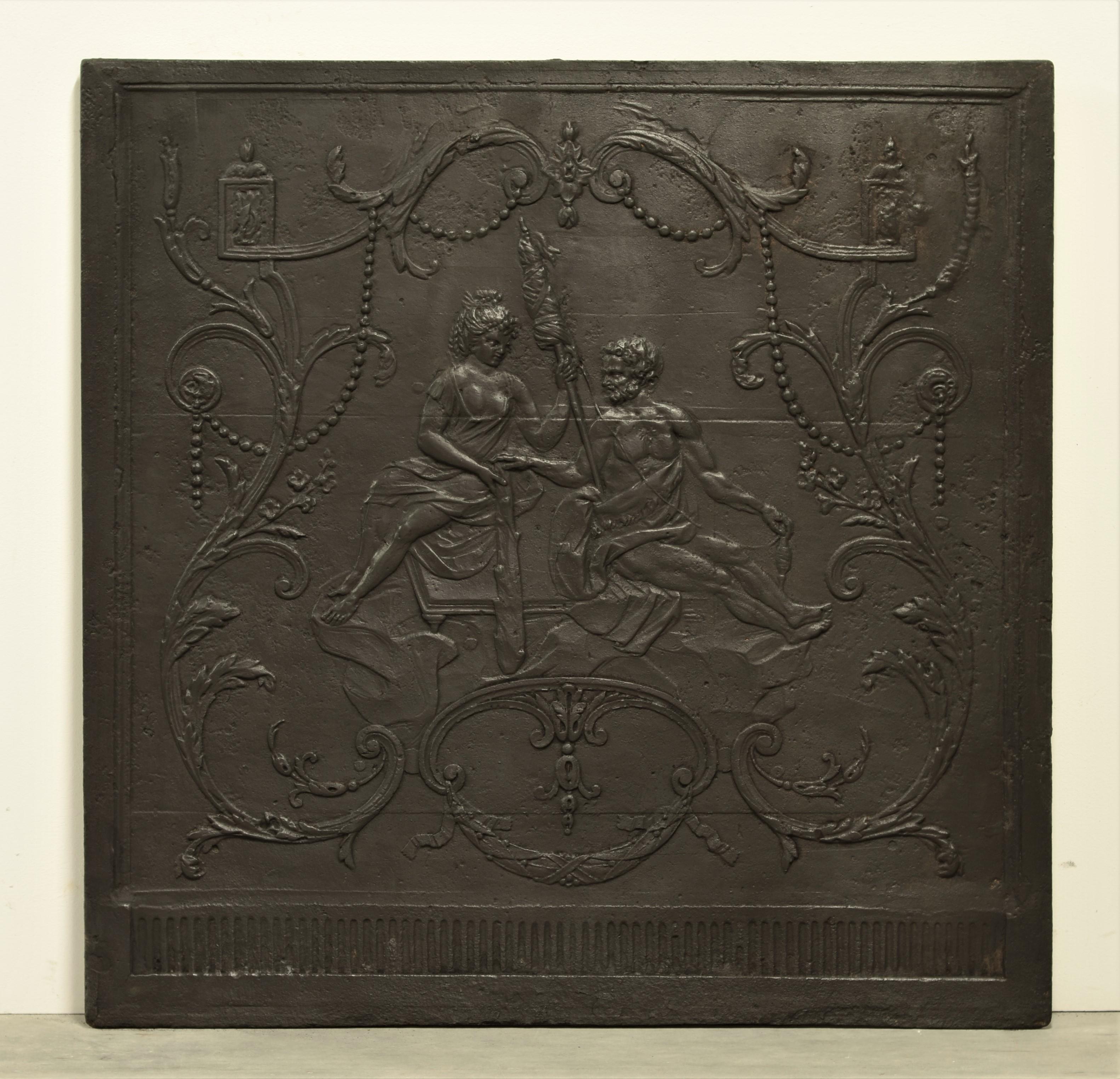 A beautiful square cast iron Louis XV fireback or backsplash from the 18th century. Displaying the spell of Omphale, Queen of Lydia.
Hercules is spinning the wool, spindle and distaff in hand at Omphale's feet.

The beautiful original condition,