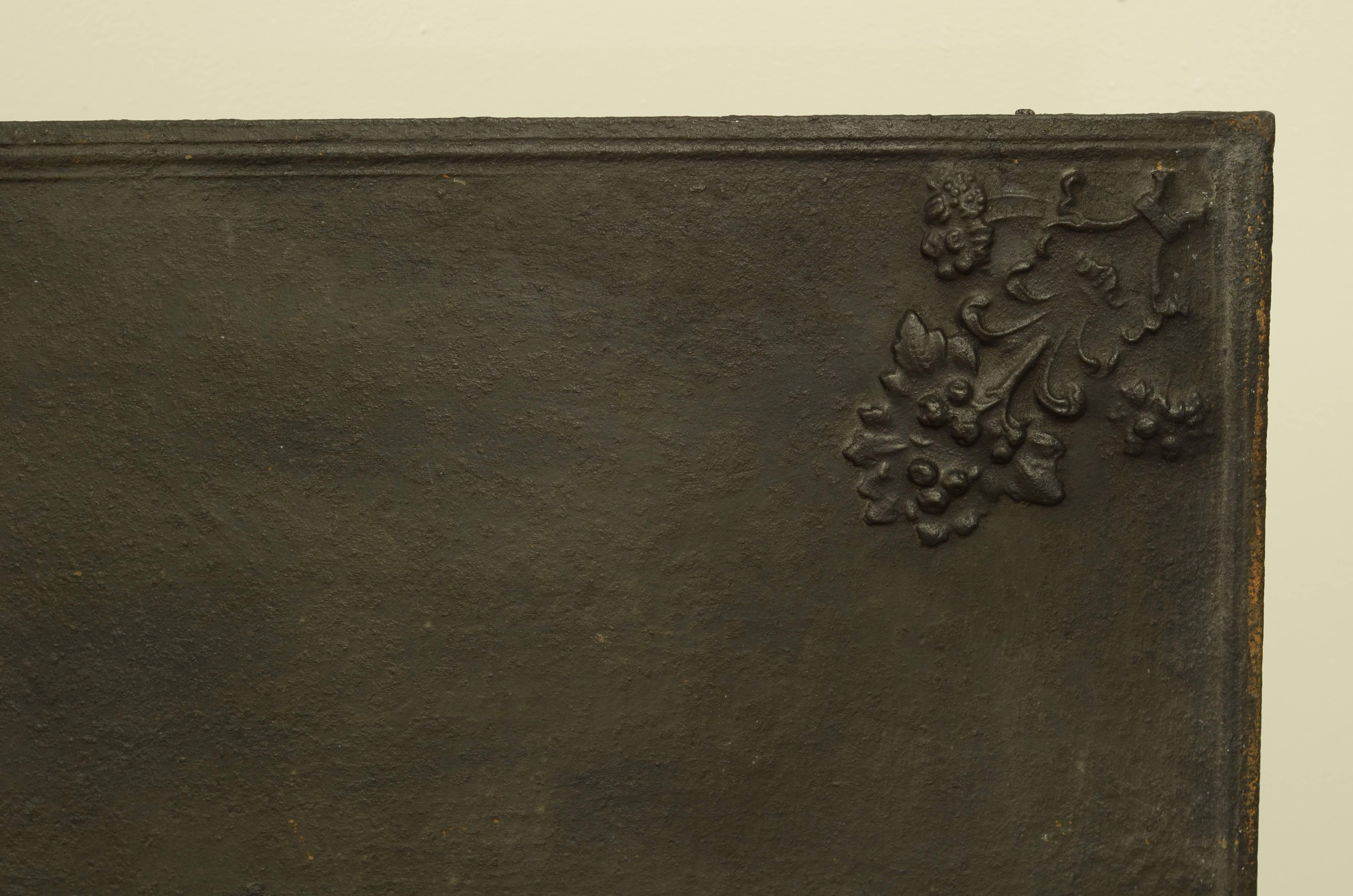 European Antique Fireback Displaying Beautiful Flowered Corners