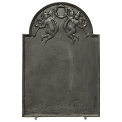 Antique Fireback or Backsplash with Two Putti Playing the Trumpet