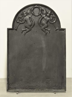 Antique Fireback or Backsplash with Two Putti Playing the Trumpet
