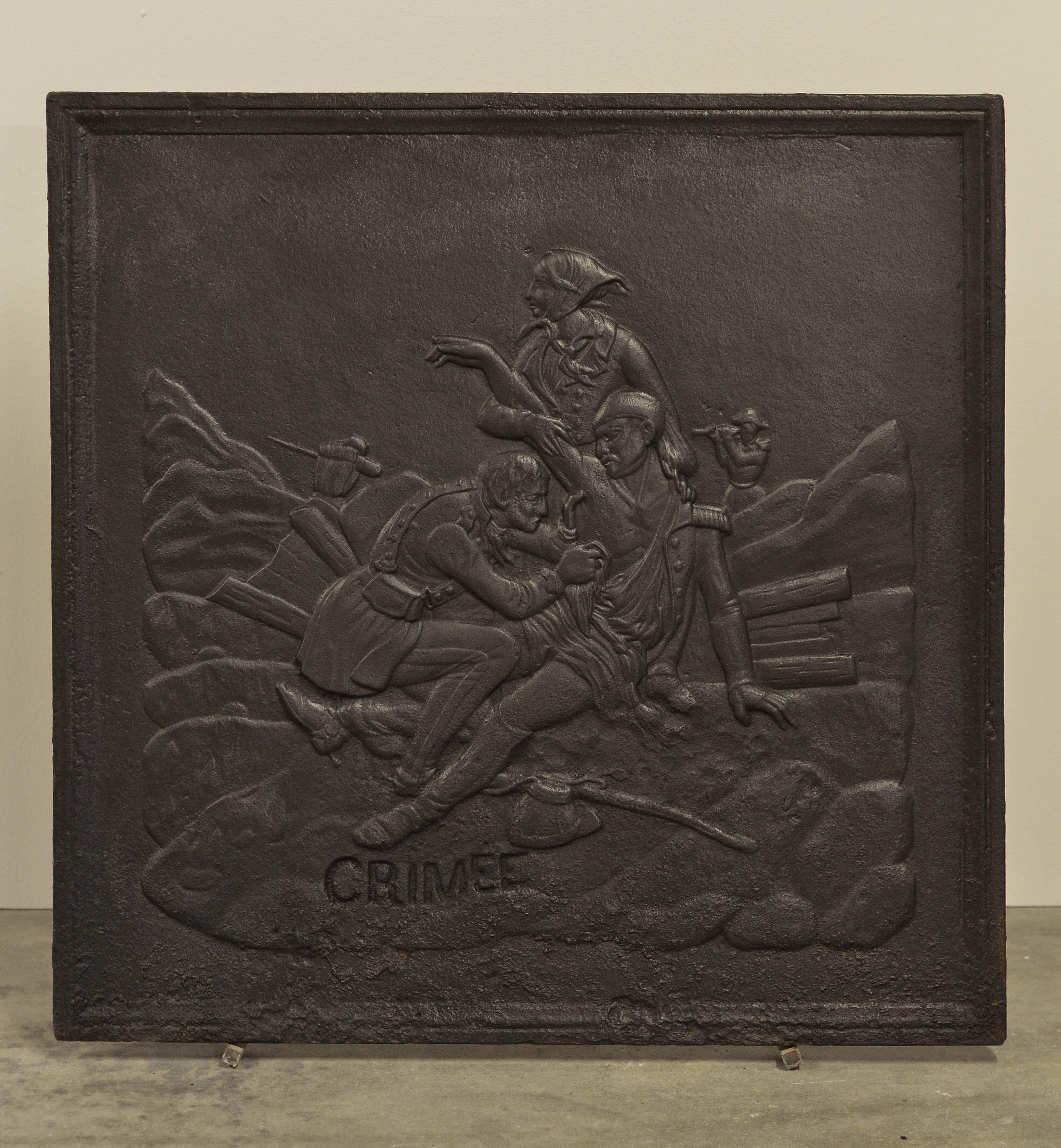 Nice square cast iron fireback displaying a wounded soldier during the Crimean war between the Russian Empire and the Ottoman Empire.

Excellent condition and usable size.
This fireback is in excellent condition it can be used in a fireplace or