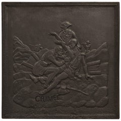 Plaque de cheminée ancienne montrant la bataille de Crimée
