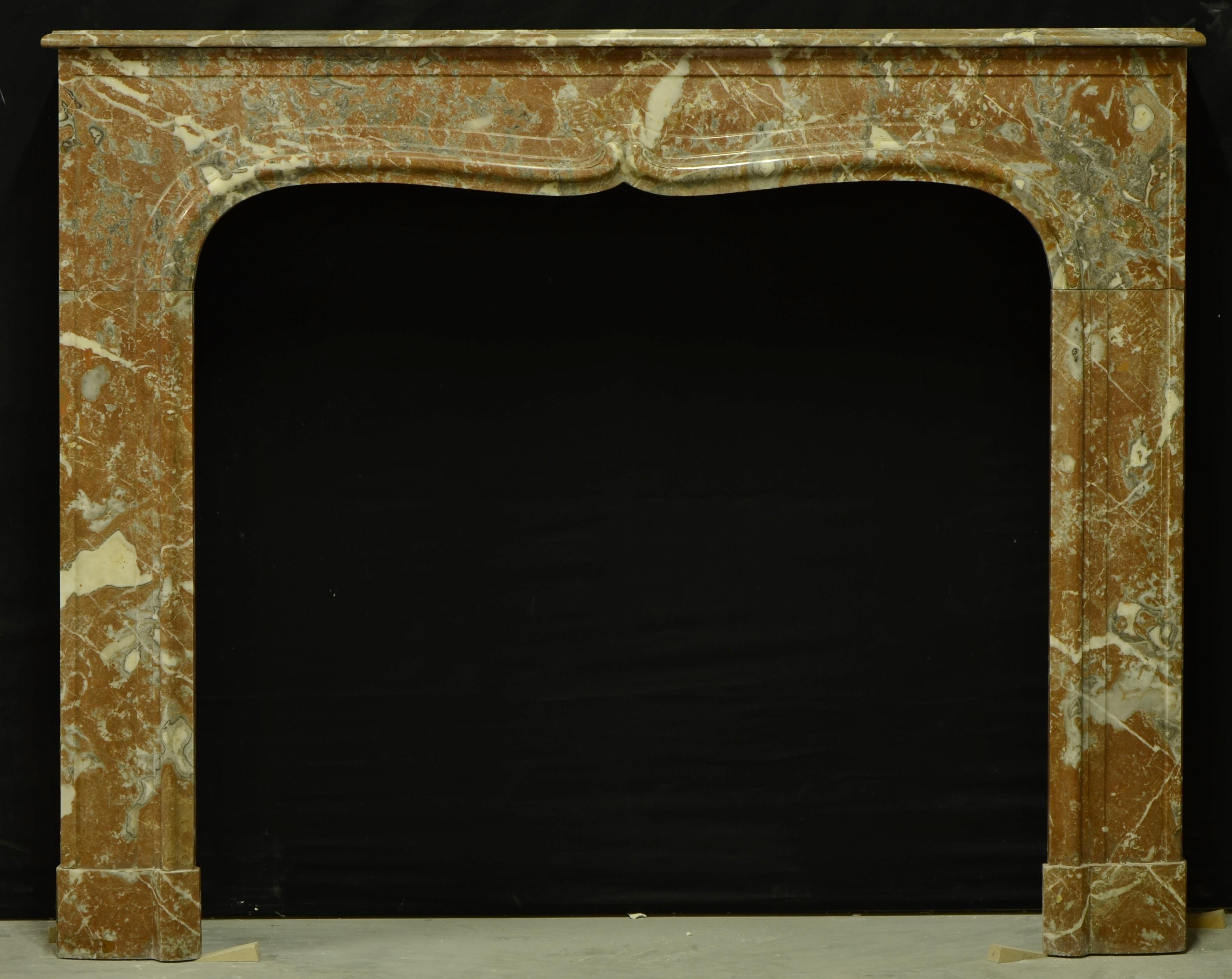 A nice French marble Louis XIV fireplaces mantel.
The gracious lines and perfect sizing makes this nice piece very versatile.

Would be great in a master suite or 