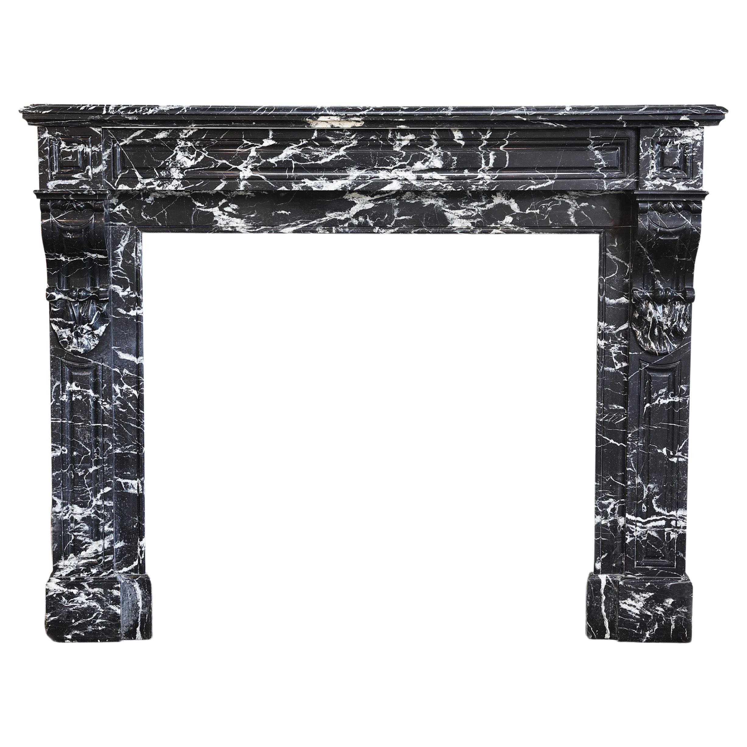 antique fireplace from the 19th century in Nero Marquina marble style Louis XVI For Sale