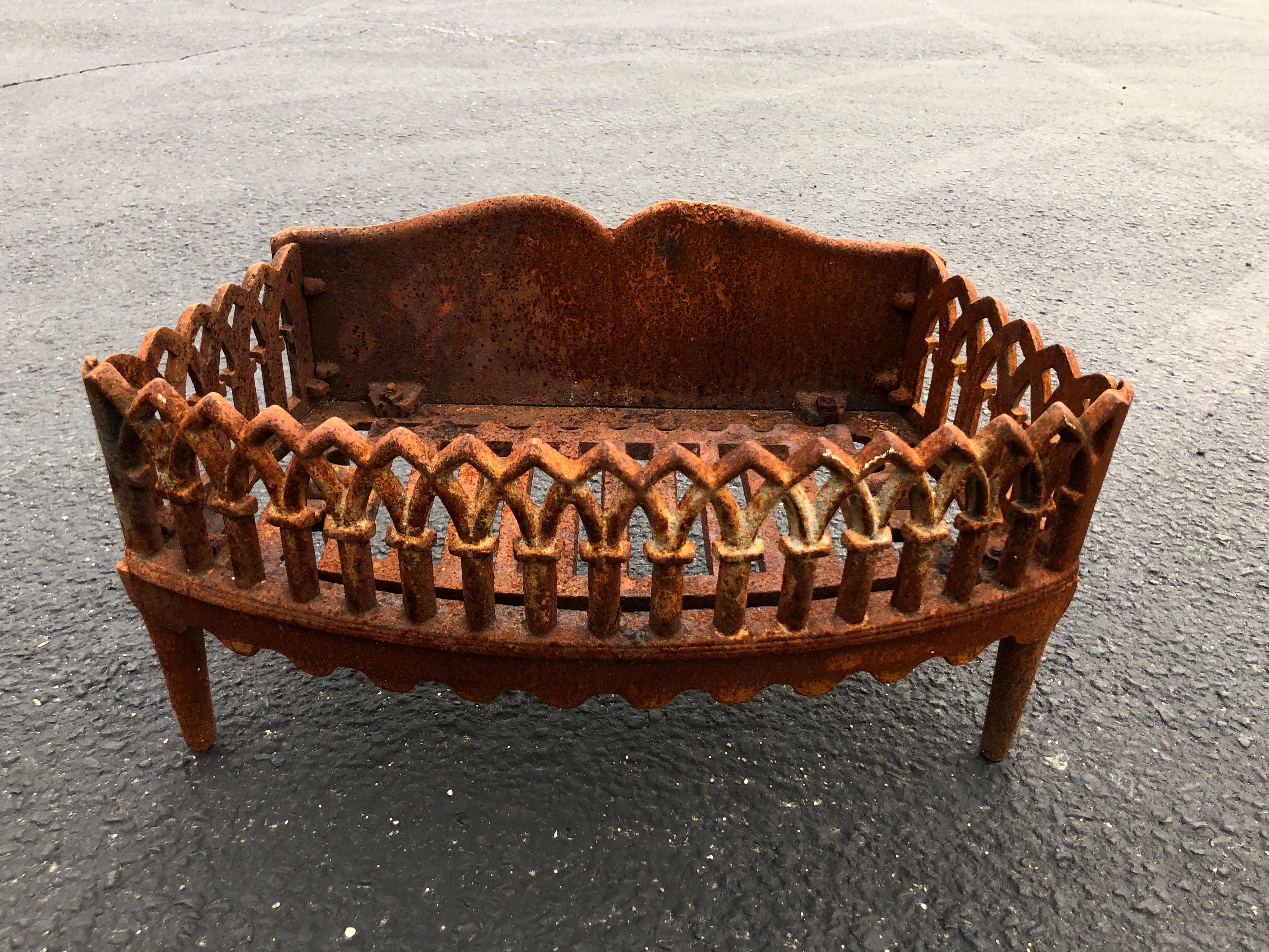 Antique fireplace grate . Solid Iron. Use in your fireplace or on the side for fresh wood. Could also be used as an outdoor planter on the front step. This item can parcel ship for $45.

  