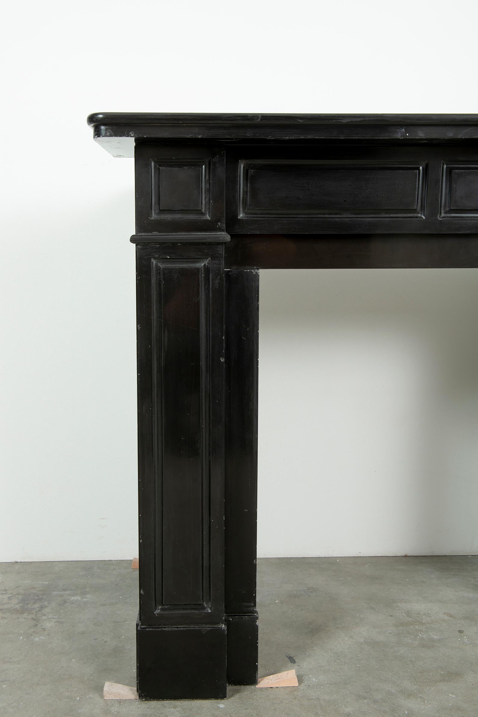Chimenea antigua de mármol negro 9