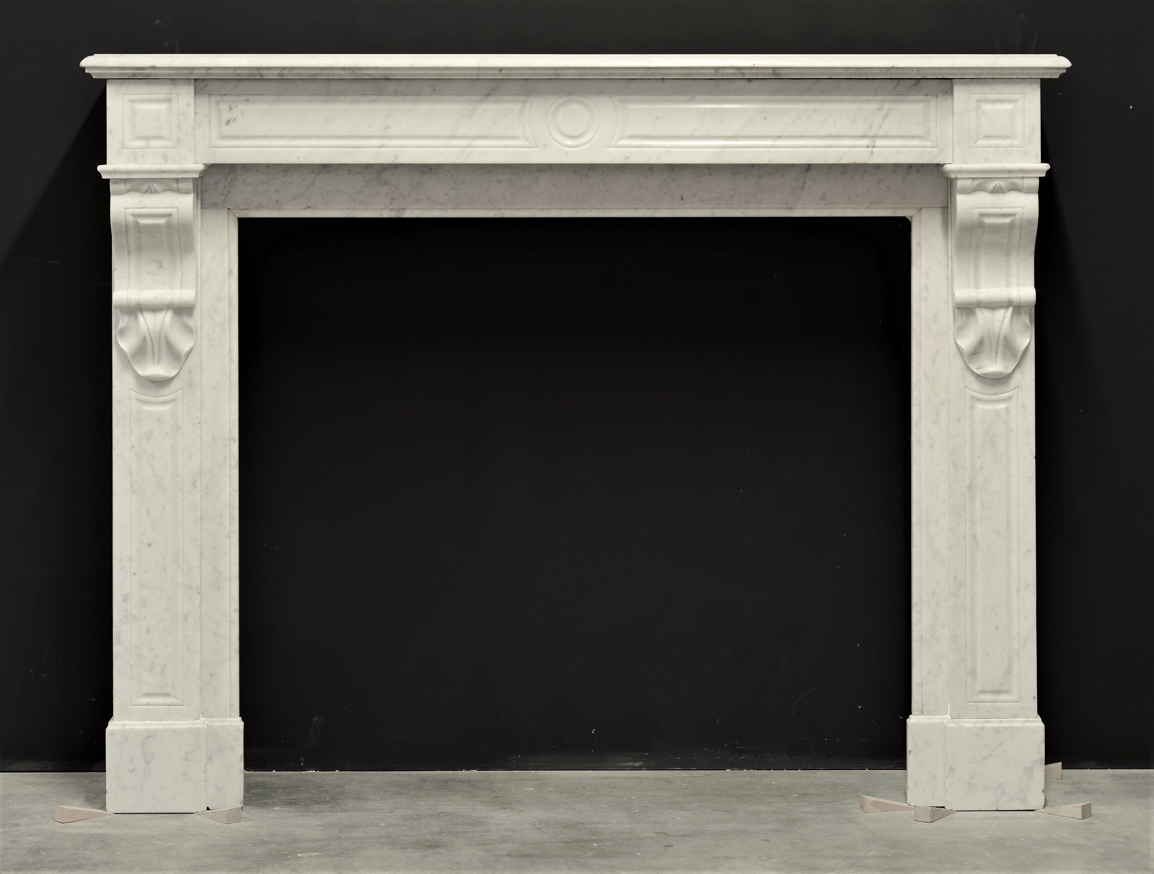 Small, elegant French Louis Philippe style fireplace in white Carrara marble.
Perfect usable size, great condition.

Opening dimensions:
Height: 33.26 inch or 84.5 cm.
Width: 37.00 inch or 94 cm.

The width of the legs below the corbels is  6,69