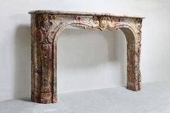 Cheminée ancienne - XIXe siècle - Marbre de Sarrancolin - Style Louis XV