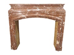 old fireplace mantel in the style of Louis XV