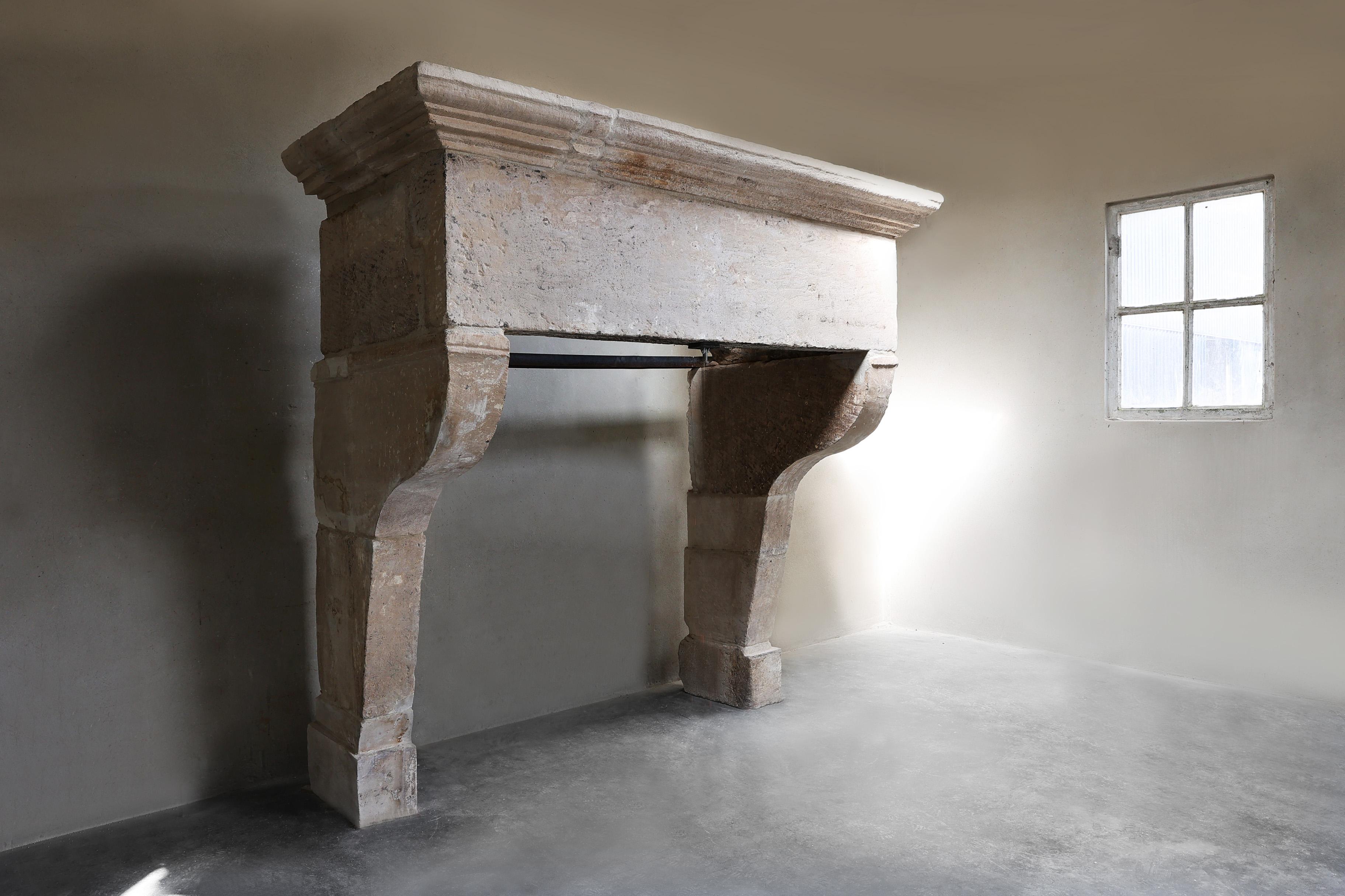 Antique Fireplace Mantel from the 17th century of french limestone For Sale 6