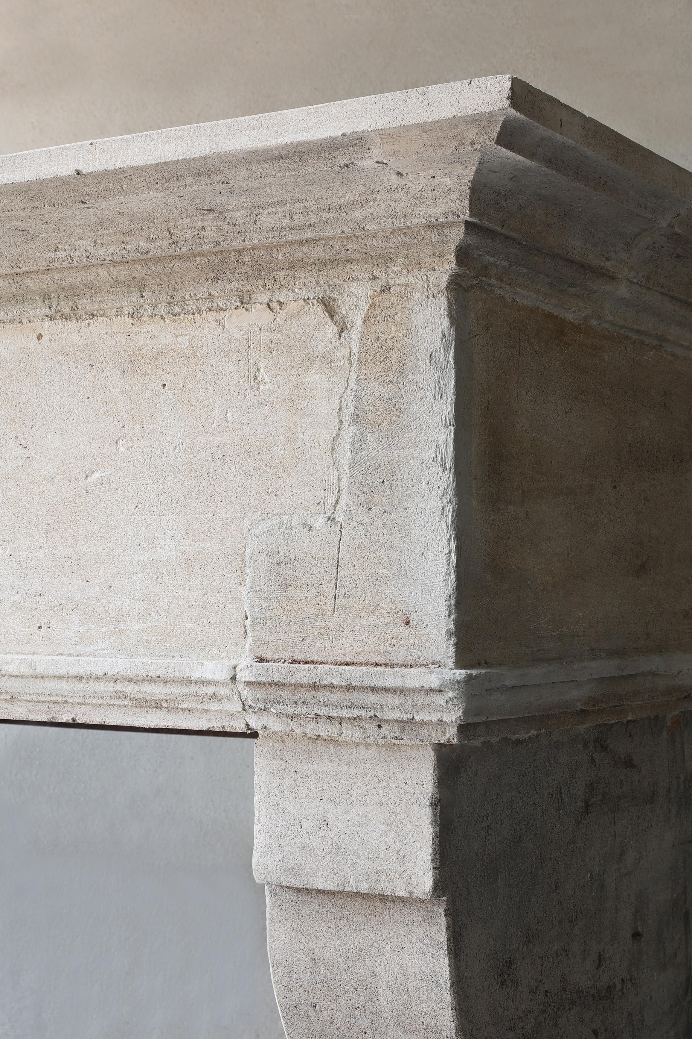 Limestone Antique Fireplace Mantel from the 19th century of french limestone For Sale