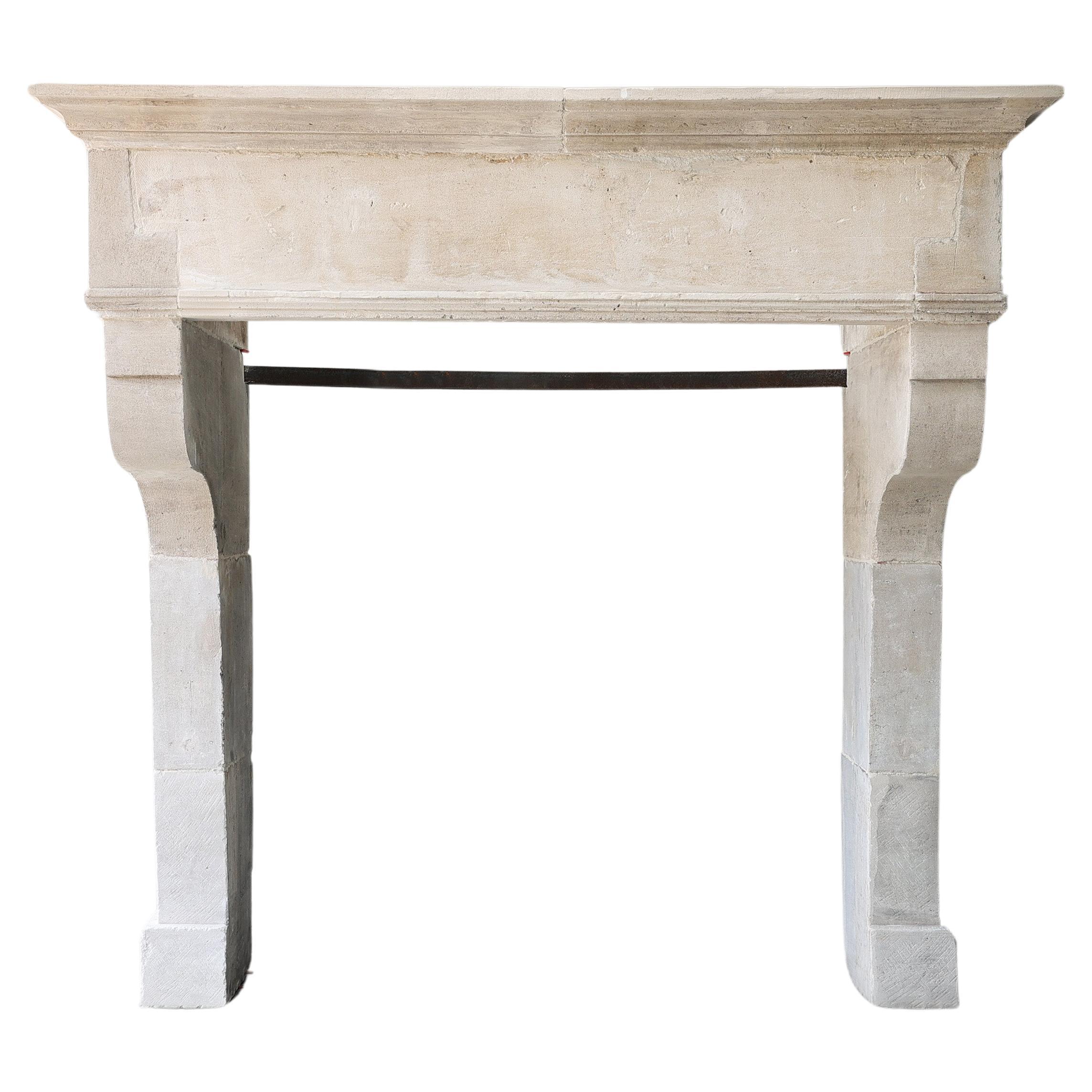 Antique Fireplace Mantel from the 19th century of french limestone For Sale