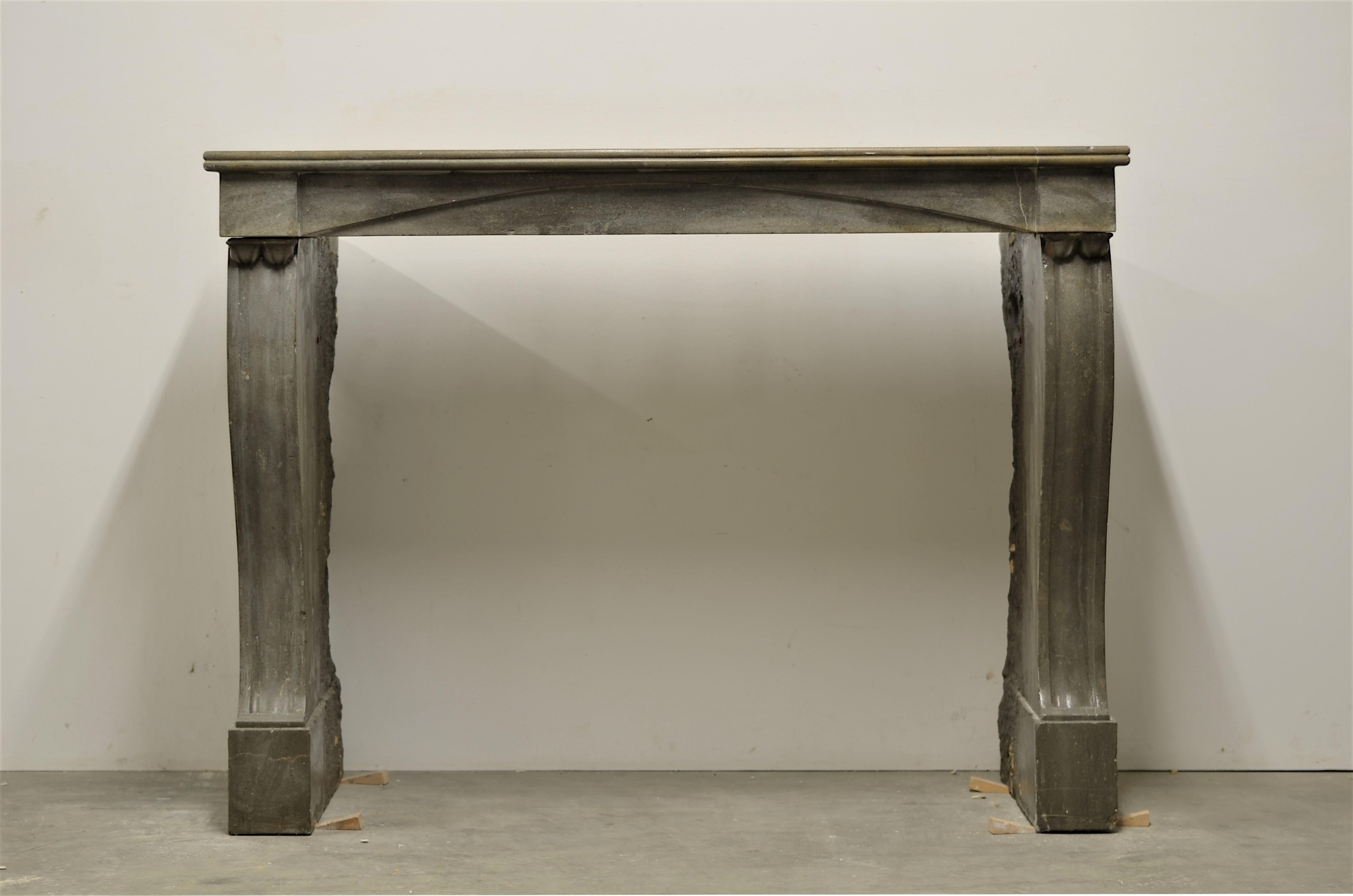 Very nice sized an subtel decorated French “Campagnard” style fireplace mantel.
This mantel comes from the burgundy area and was reclaimed from a nice proportioned small estate.
The warm grey/ greenish coloring and nice decorative lines make this