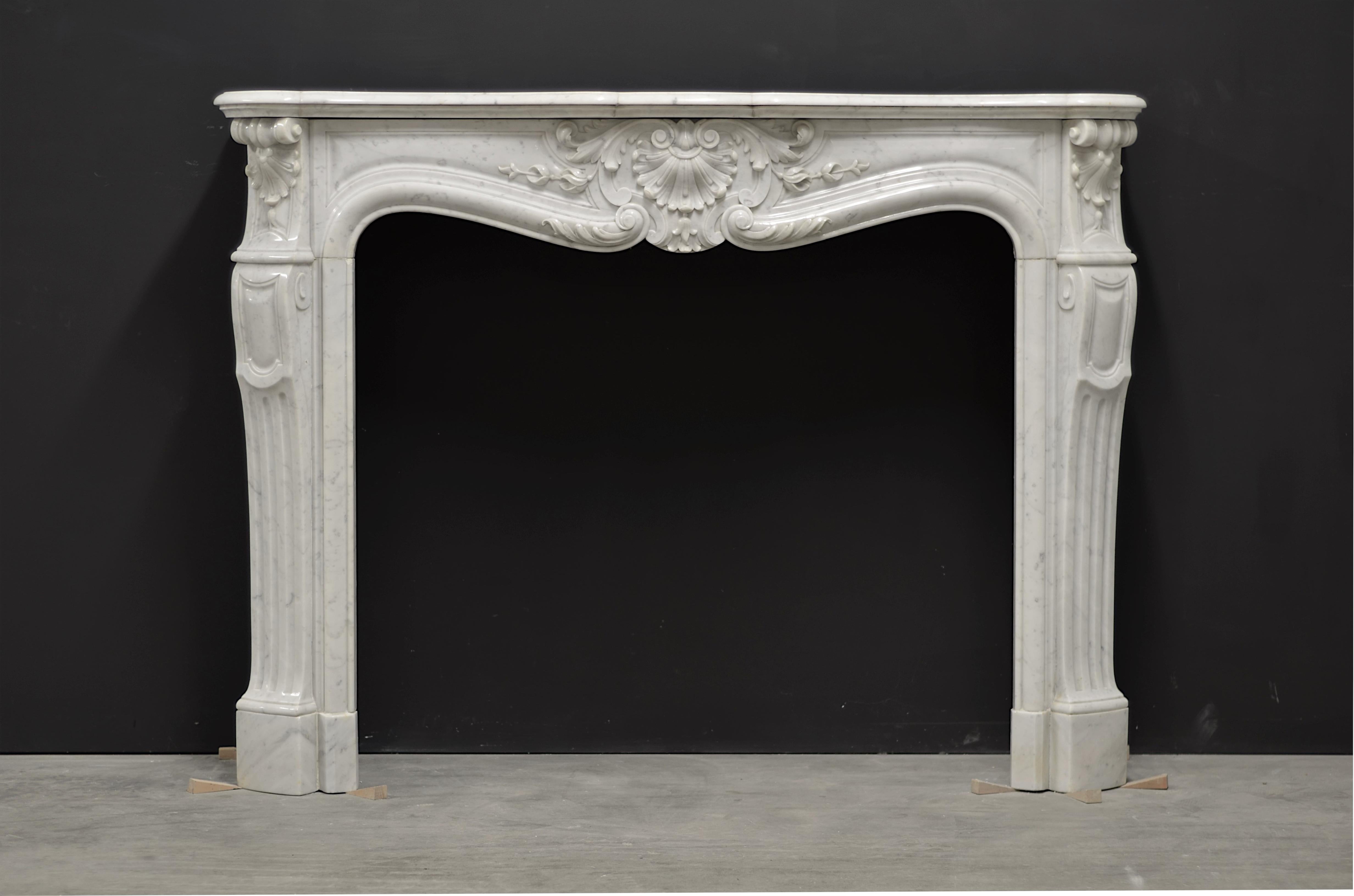 Nice and decorative French Louis XV fireplace mantel.
This stylish 19th century mantel has the perfect usable dimensions.
Lovey decorated, overall nice condition, some minor chips.

Can be sold with colored marble floor.
Sold by Schermerhorn