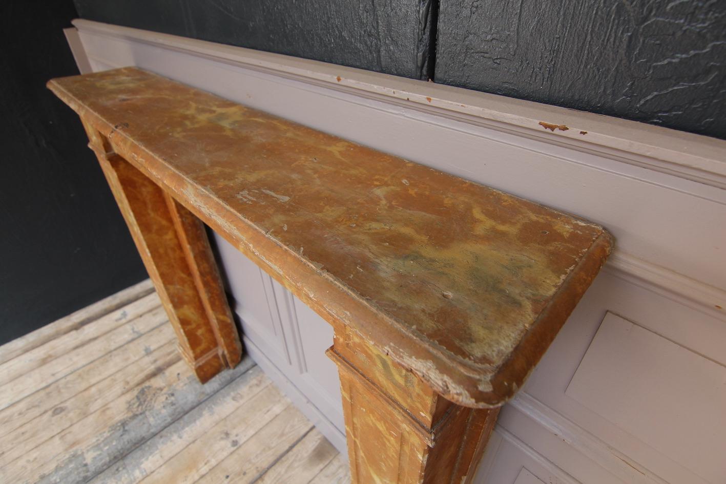 French 19th Century Fireplace Mantel made of Wood in Original Marbled Painting For Sale