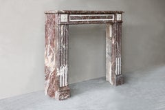 Antique Fireplace Mantel of Rouge Royal marble, 18th century, Louis XVI